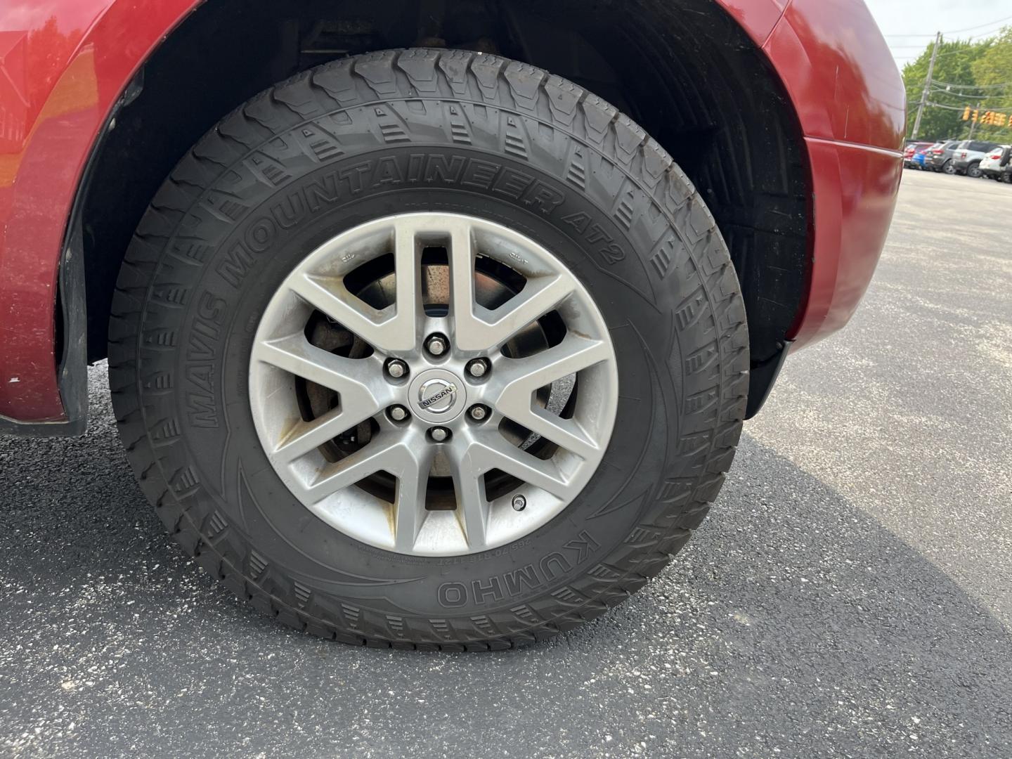 2016 Red /Gray Nissan Frontier SV Crew Cab 5AT 4WD (1N6AD0EV3GN) with an 4.0L V6 DOHC 24V engine, Automatic transmission, located at 11115 Chardon Rd. , Chardon, OH, 44024, (440) 214-9705, 41.580246, -81.241943 - 2016 Nissan Frontier SV Crew Cab 4WD – Reliable Midsize Truck with Strong V6 Power and Towing Capability! This 2016 Nissan Frontier SV Crew Cab 4WD is a tough, practical midsize truck that’s ready for work or weekend adventures. Powered by a proven 4.0L V6 engine producing 261 HP and 281 lb-ft- Photo#5