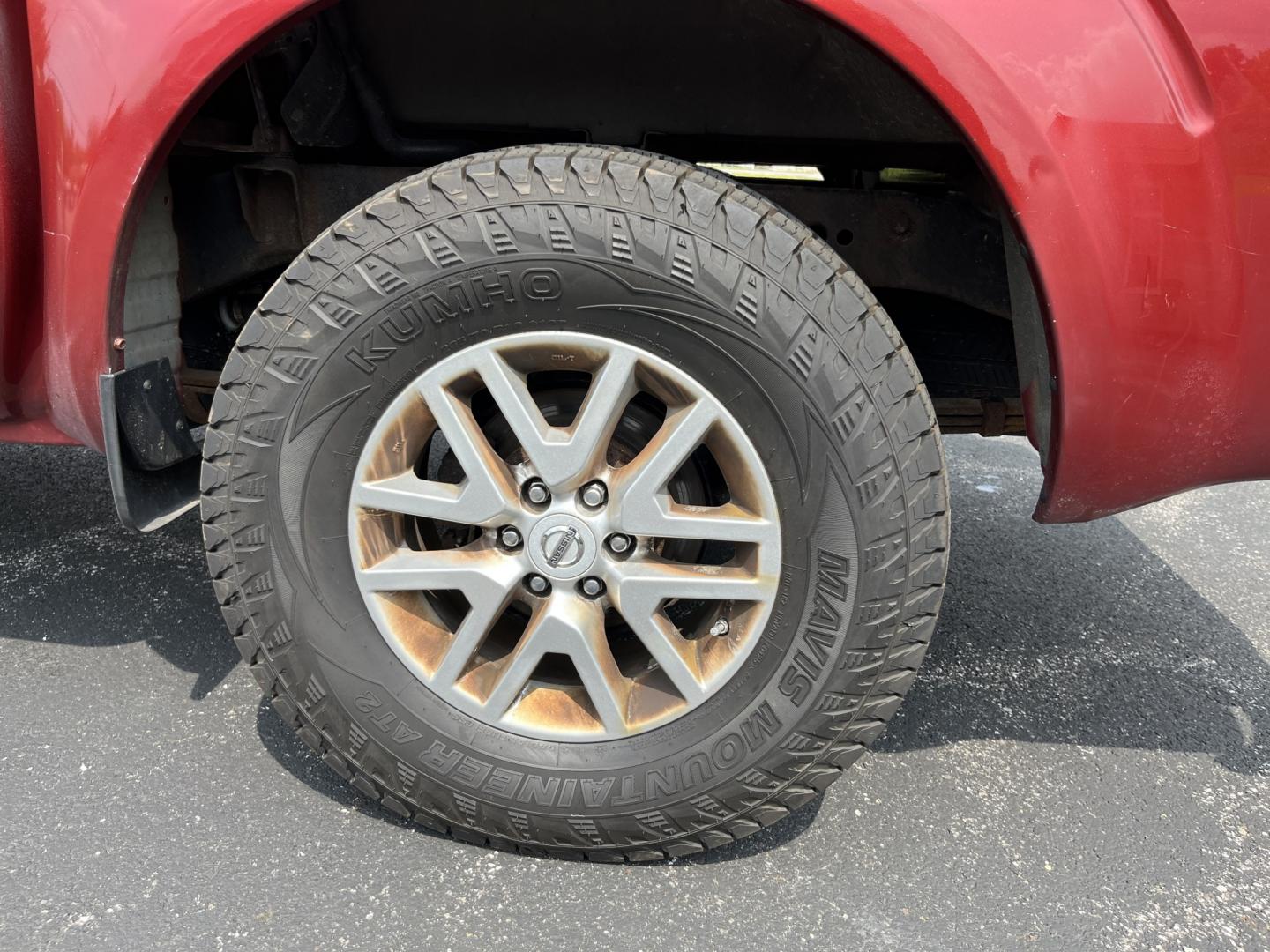 2016 Red /Gray Nissan Frontier SV Crew Cab 5AT 4WD (1N6AD0EV3GN) with an 4.0L V6 DOHC 24V engine, Automatic transmission, located at 11115 Chardon Rd. , Chardon, OH, 44024, (440) 214-9705, 41.580246, -81.241943 - 2016 Nissan Frontier SV Crew Cab 4WD – Reliable Midsize Truck with Strong V6 Power and Towing Capability! This 2016 Nissan Frontier SV Crew Cab 4WD is a tough, practical midsize truck that’s ready for work or weekend adventures. Powered by a proven 4.0L V6 engine producing 261 HP and 281 lb-ft- Photo#11