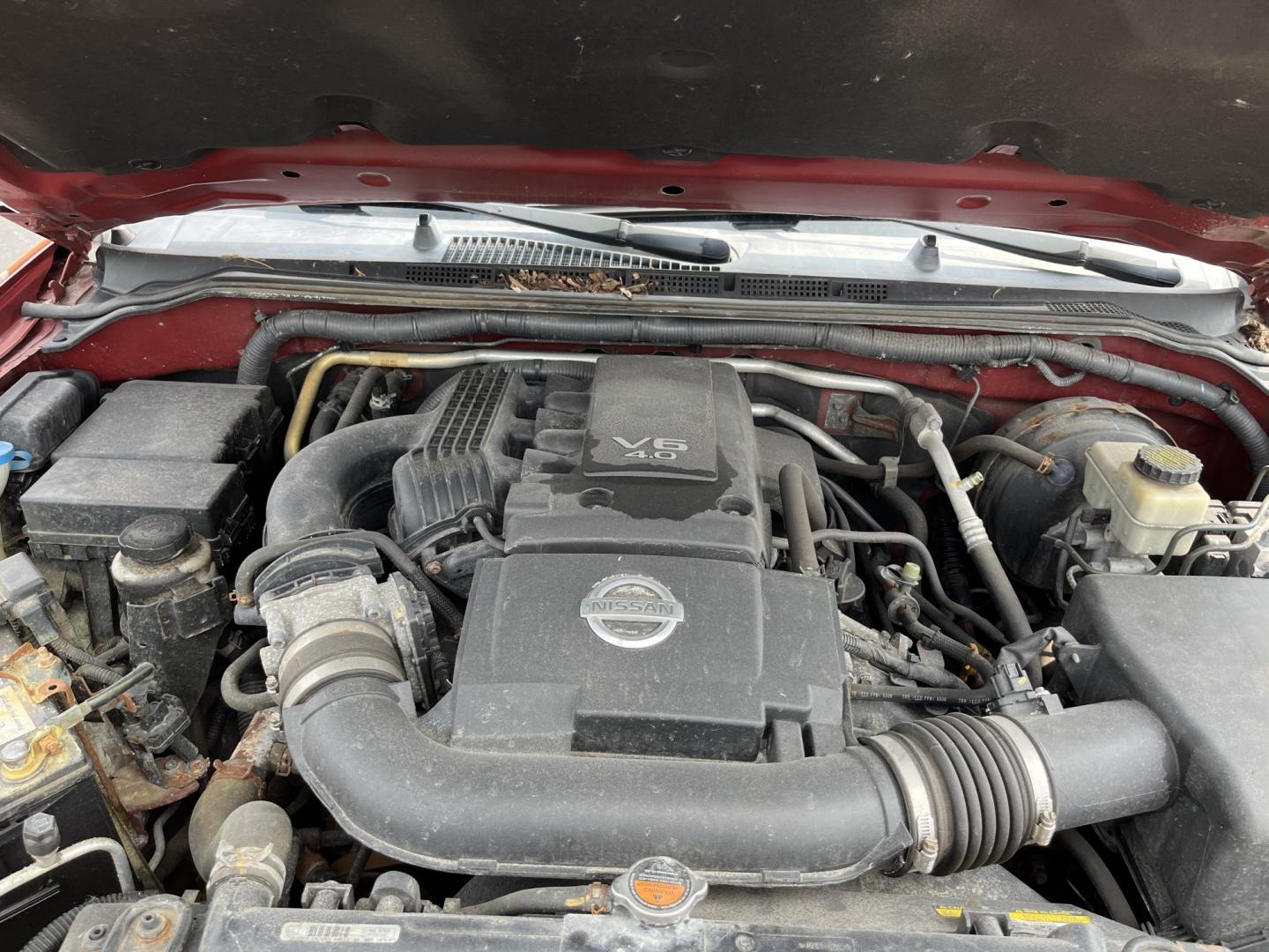 2016 Red /Gray Nissan Frontier SV Crew Cab 5AT 4WD (1N6AD0EV3GN) with an 4.0L V6 DOHC 24V engine, Automatic transmission, located at 11115 Chardon Rd. , Chardon, OH, 44024, (440) 214-9705, 41.580246, -81.241943 - 2016 Nissan Frontier SV Crew Cab 4WD – Reliable Midsize Truck with Strong V6 Power and Towing Capability! This 2016 Nissan Frontier SV Crew Cab 4WD is a tough, practical midsize truck that’s ready for work or weekend adventures. Powered by a proven 4.0L V6 engine producing 261 HP and 281 lb-ft- Photo#14