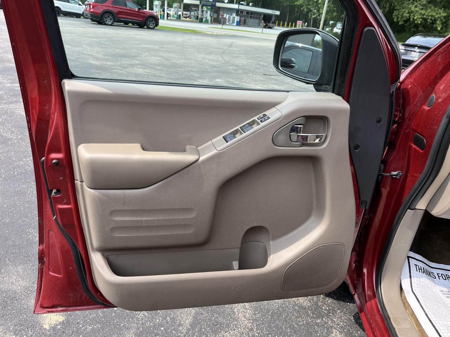 2016 Red /Gray Nissan Frontier SV Crew Cab 5AT 4WD (1N6AD0EV3GN) with an 4.0L V6 DOHC 24V engine, Automatic transmission, located at 11115 Chardon Rd. , Chardon, OH, 44024, (440) 214-9705, 41.580246, -81.241943 - 2016 Nissan Frontier SV Crew Cab 4WD – Reliable Midsize Truck with Strong V6 Power and Towing Capability! This 2016 Nissan Frontier SV Crew Cab 4WD is a tough, practical midsize truck that’s ready for work or weekend adventures. Powered by a proven 4.0L V6 engine producing 261 HP and 281 lb-ft- Photo#16