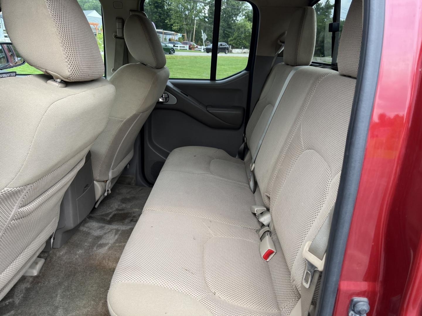 2016 Red /Gray Nissan Frontier SV Crew Cab 5AT 4WD (1N6AD0EV3GN) with an 4.0L V6 DOHC 24V engine, Automatic transmission, located at 11115 Chardon Rd. , Chardon, OH, 44024, (440) 214-9705, 41.580246, -81.241943 - 2016 Nissan Frontier SV Crew Cab 4WD – Reliable Midsize Truck with Strong V6 Power and Towing Capability! This 2016 Nissan Frontier SV Crew Cab 4WD is a tough, practical midsize truck that’s ready for work or weekend adventures. Powered by a proven 4.0L V6 engine producing 261 HP and 281 lb-ft- Photo#27