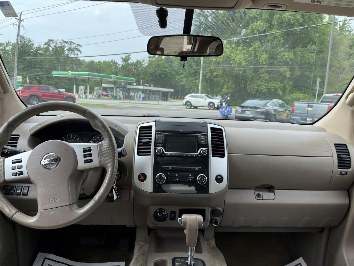 2016 Red /Gray Nissan Frontier SV Crew Cab 5AT 4WD (1N6AD0EV3GN) with an 4.0L V6 DOHC 24V engine, Automatic transmission, located at 11115 Chardon Rd. , Chardon, OH, 44024, (440) 214-9705, 41.580246, -81.241943 - 2016 Nissan Frontier SV Crew Cab 4WD – Reliable Midsize Truck with Strong V6 Power and Towing Capability! This 2016 Nissan Frontier SV Crew Cab 4WD is a tough, practical midsize truck that’s ready for work or weekend adventures. Powered by a proven 4.0L V6 engine producing 261 HP and 281 lb-ft- Photo#28