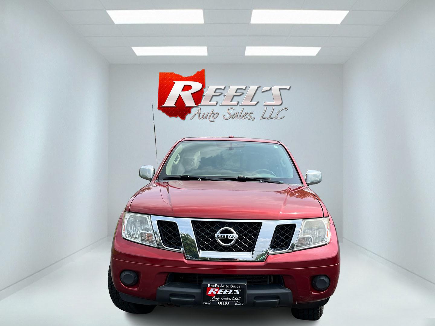 2016 Red /Gray Nissan Frontier SV Crew Cab 5AT 4WD (1N6AD0EV3GN) with an 4.0L V6 DOHC 24V engine, Automatic transmission, located at 11115 Chardon Rd. , Chardon, OH, 44024, (440) 214-9705, 41.580246, -81.241943 - 2016 Nissan Frontier SV Crew Cab 4WD – Reliable Midsize Truck with Strong V6 Power and Towing Capability! This 2016 Nissan Frontier SV Crew Cab 4WD is a tough, practical midsize truck that’s ready for work or weekend adventures. Powered by a proven 4.0L V6 engine producing 261 HP and 281 lb-ft- Photo#2