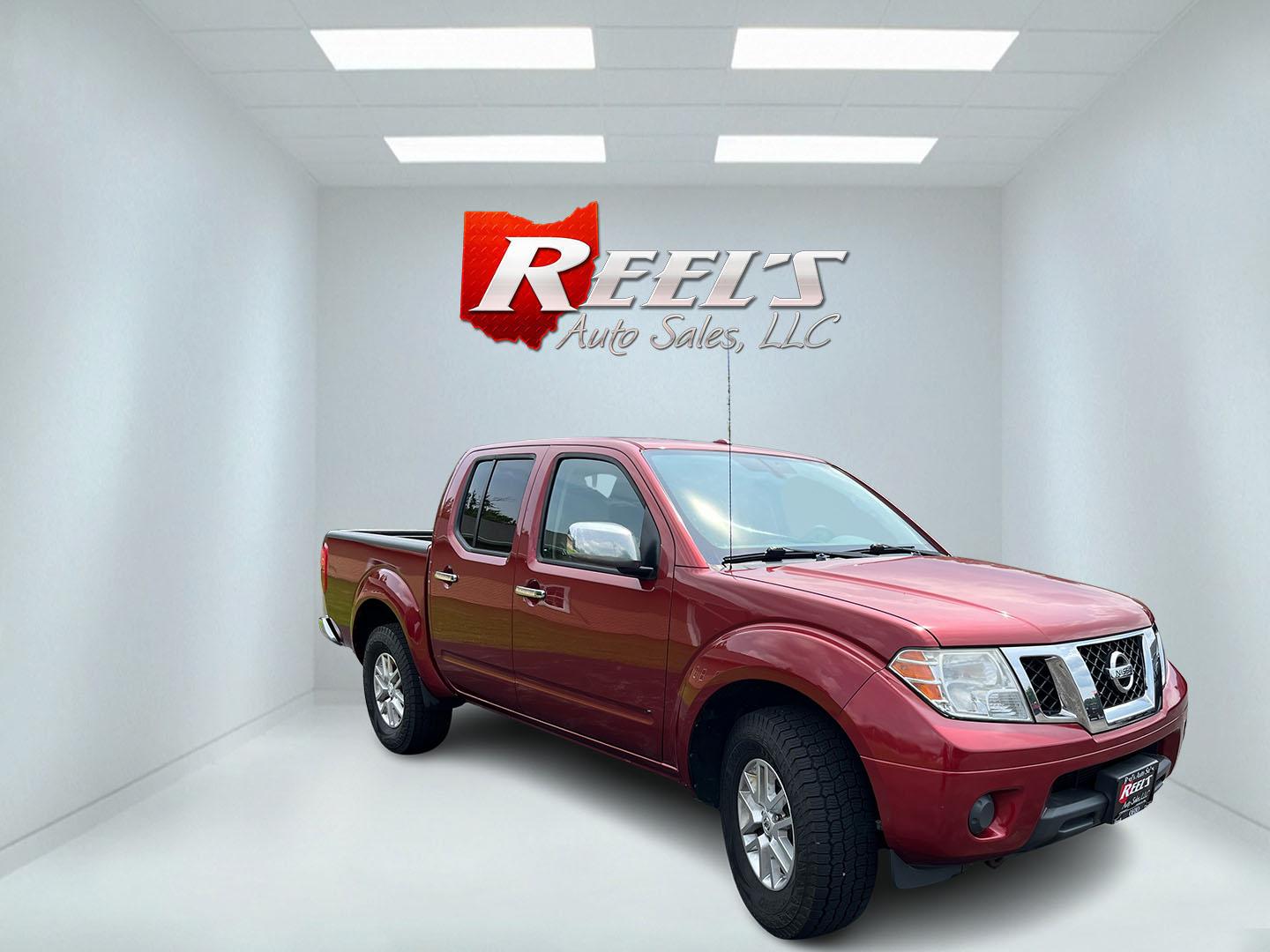 2016 Red /Gray Nissan Frontier SV Crew Cab 5AT 4WD (1N6AD0EV3GN) with an 4.0L V6 DOHC 24V engine, Automatic transmission, located at 11115 Chardon Rd. , Chardon, OH, 44024, (440) 214-9705, 41.580246, -81.241943 - 2016 Nissan Frontier SV Crew Cab 4WD – Reliable Midsize Truck with Strong V6 Power and Towing Capability! This 2016 Nissan Frontier SV Crew Cab 4WD is a tough, practical midsize truck that’s ready for work or weekend adventures. Powered by a proven 4.0L V6 engine producing 261 HP and 281 lb-ft- Photo#3