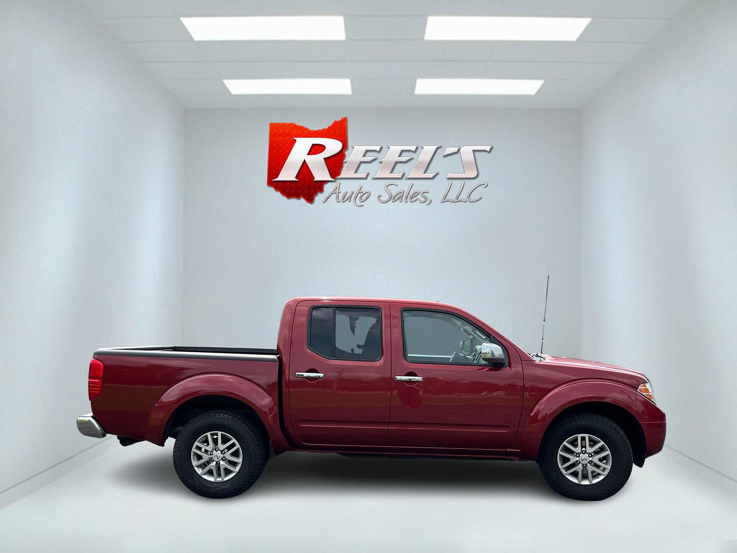 2016 Red /Gray Nissan Frontier SV Crew Cab 5AT 4WD (1N6AD0EV3GN) with an 4.0L V6 DOHC 24V engine, Automatic transmission, located at 11115 Chardon Rd. , Chardon, OH, 44024, (440) 214-9705, 41.580246, -81.241943 - 2016 Nissan Frontier SV Crew Cab 4WD – Reliable Midsize Truck with Strong V6 Power and Towing Capability! This 2016 Nissan Frontier SV Crew Cab 4WD is a tough, practical midsize truck that’s ready for work or weekend adventures. Powered by a proven 4.0L V6 engine producing 261 HP and 281 lb-ft- Photo#6