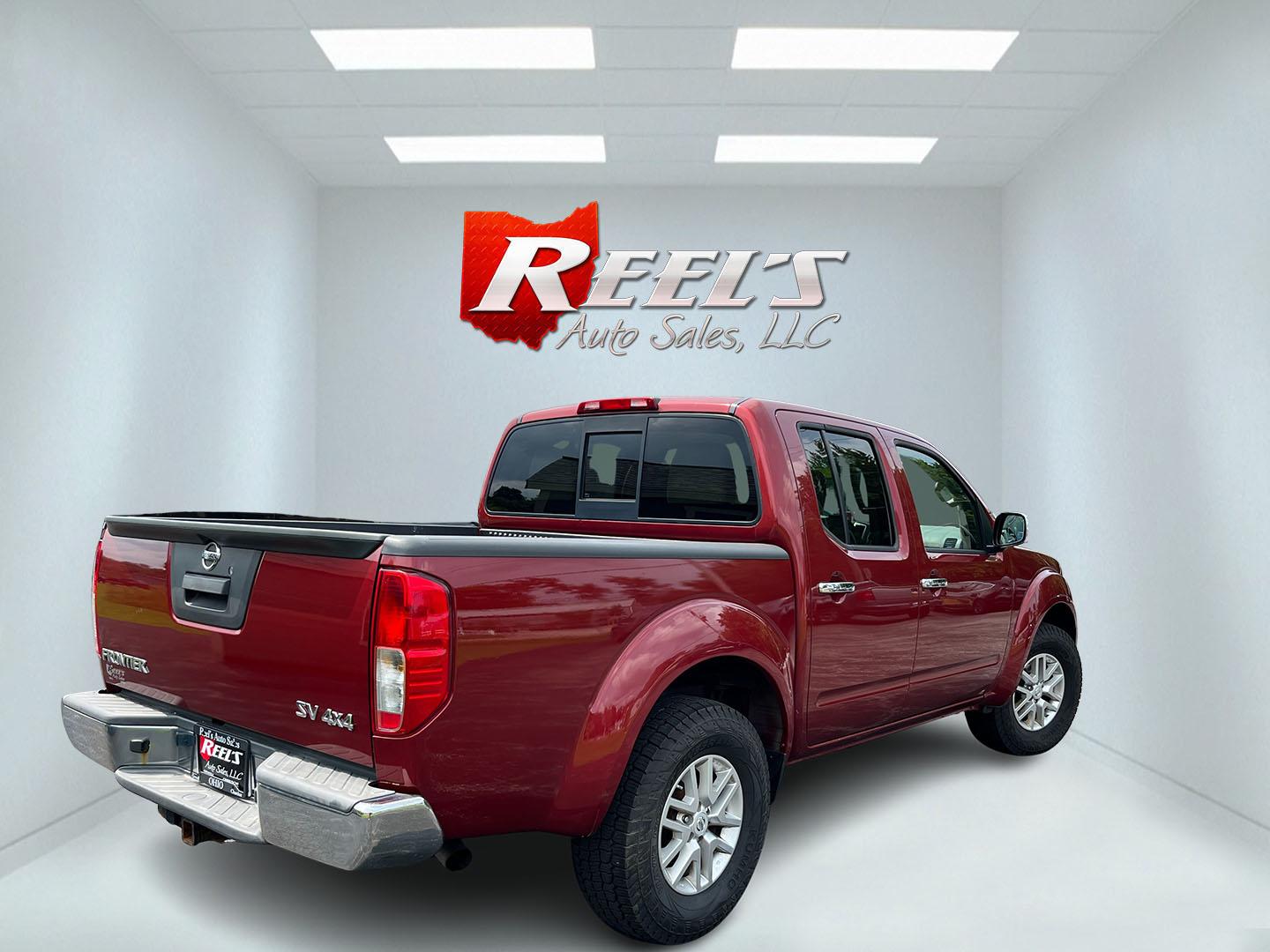 2016 Red /Gray Nissan Frontier SV Crew Cab 5AT 4WD (1N6AD0EV3GN) with an 4.0L V6 DOHC 24V engine, Automatic transmission, located at 11115 Chardon Rd. , Chardon, OH, 44024, (440) 214-9705, 41.580246, -81.241943 - 2016 Nissan Frontier SV Crew Cab 4WD – Reliable Midsize Truck with Strong V6 Power and Towing Capability! This 2016 Nissan Frontier SV Crew Cab 4WD is a tough, practical midsize truck that’s ready for work or weekend adventures. Powered by a proven 4.0L V6 engine producing 261 HP and 281 lb-ft- Photo#7