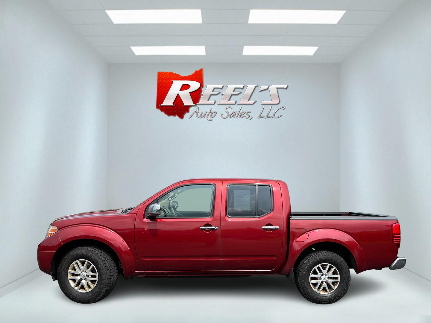 2016 Red /Gray Nissan Frontier SV Crew Cab 5AT 4WD (1N6AD0EV3GN) with an 4.0L V6 DOHC 24V engine, Automatic transmission, located at 11115 Chardon Rd. , Chardon, OH, 44024, (440) 214-9705, 41.580246, -81.241943 - 2016 Nissan Frontier SV Crew Cab 4WD – Reliable Midsize Truck with Strong V6 Power and Towing Capability! This 2016 Nissan Frontier SV Crew Cab 4WD is a tough, practical midsize truck that’s ready for work or weekend adventures. Powered by a proven 4.0L V6 engine producing 261 HP and 281 lb-ft- Photo#12