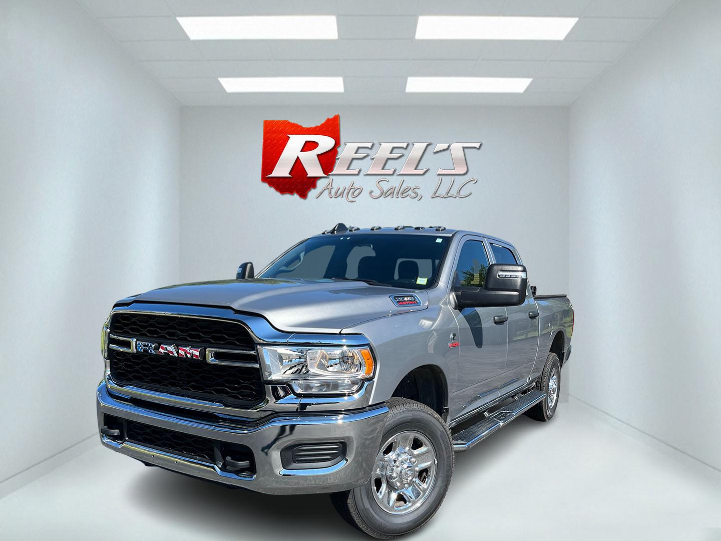 2024 Silver /Black RAM 2500 Tradesman Crew Cab SWB 4WD (3C6UR5CL9RG) with an 6.7L I6 OHV 24V TURBO DIESEL engine, Automatic transmission, located at 11115 Chardon Rd. , Chardon, OH, 44024, (440) 214-9705, 41.580246, -81.241943 - 2024 Ram 2500 Tradesman Crew Cab 4WD – Heavy-Duty Cummins Power with Massive Towing and One-Owner History! This 2024 Ram 2500 Tradesman Crew Cab 4WD is a tough, work-ready heavy-duty truck with impressive capability and one-owner history. Powered by the powerful 6.7L I6 Cummins engine producing 3- Photo#0