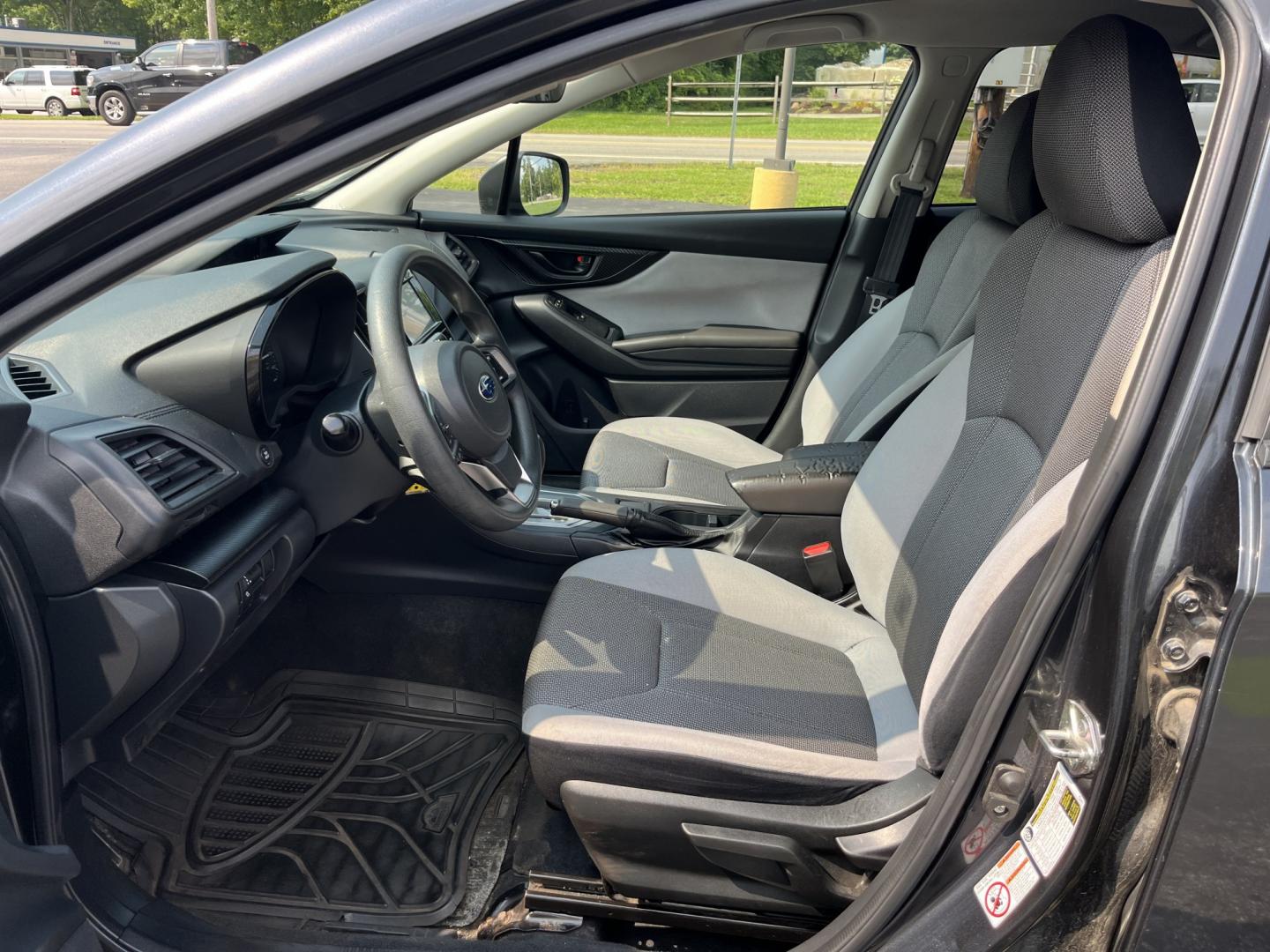 2019 Gray /Black Subaru Crosstrek 2.0i Base W/ EyesightCVT (JF2GTABC4KH) with an 2.0L H4 DOHC 16V engine, Automatic transmission, located at 11115 Chardon Rd. , Chardon, OH, 44024, (440) 214-9705, 41.580246, -81.241943 - 2019 Subaru Crosstrek 2.0i – Practical AWD Confidence for Everyday Driving If you want a compact crossover that feels capable without being oversized or complicated, this 2019 Subaru Crosstrek 2.0i is worth a close look. The 2.0L engine pairs with Subaru’s full-time Symmetrical All-Wheel Drive- Photo#17