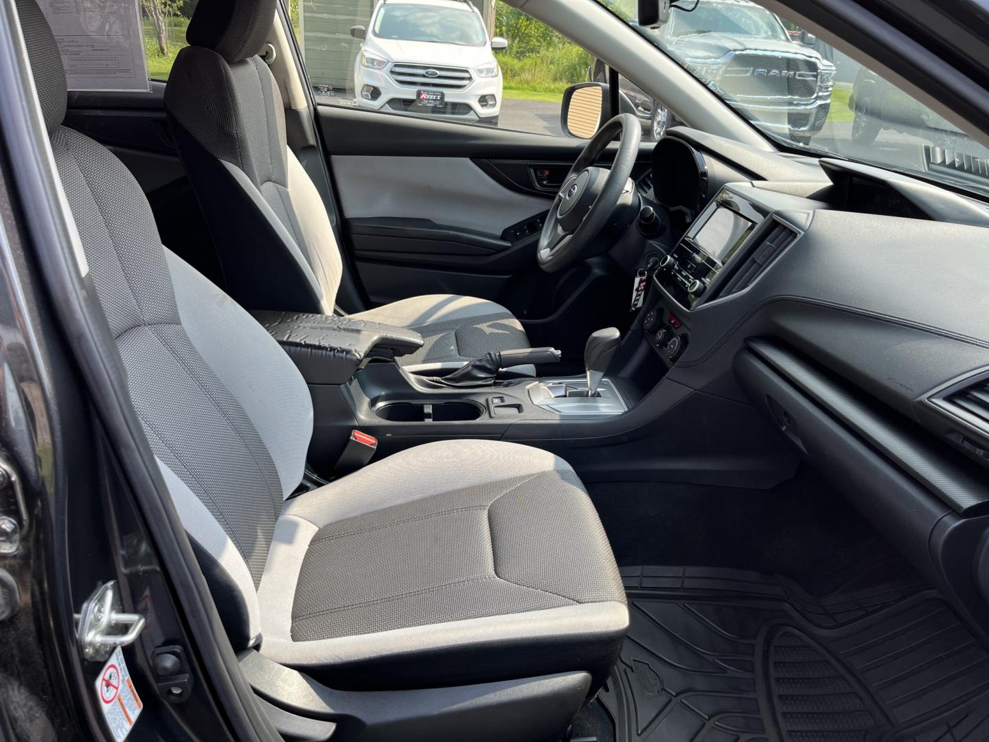 2019 Gray /Black Subaru Crosstrek 2.0i Base W/ EyesightCVT (JF2GTABC4KH) with an 2.0L H4 DOHC 16V engine, Automatic transmission, located at 11115 Chardon Rd. , Chardon, OH, 44024, (440) 214-9705, 41.580246, -81.241943 - 2019 Subaru Crosstrek 2.0i – Practical AWD Confidence for Everyday Driving If you want a compact crossover that feels capable without being oversized or complicated, this 2019 Subaru Crosstrek 2.0i is worth a close look. The 2.0L engine pairs with Subaru’s full-time Symmetrical All-Wheel Drive- Photo#33