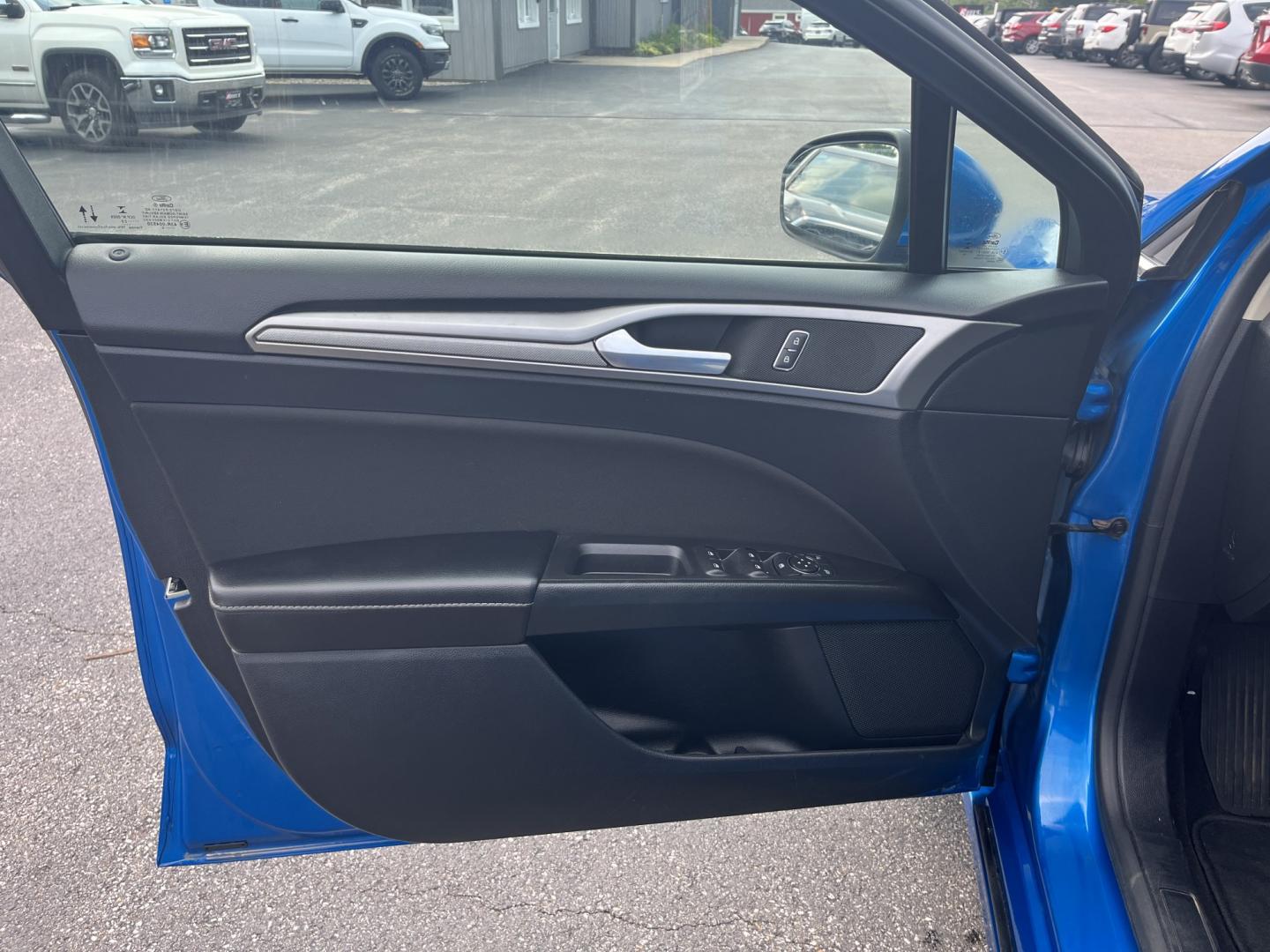 2020 Blue /Black Ford Fusion SE AWD (3FA6P0T99LR) with an 2.0L I4 DOHC 16V Turbo engine, Automatic transmission, located at 11115 Chardon Rd. , Chardon, OH, 44024, (440) 214-9705, 41.580246, -81.241943 - 2020 Ford Fusion SE AWD – Efficient Turbo Sedan with Fresh Tires and Advanced Safety Features! This 2020 Ford Fusion SE AWD is a stylish and capable midsize sedan that offers strong performance and confident all-weather handling. Powered by a responsive 2.0L Turbocharged EcoBoost I4 engine paired- Photo#15