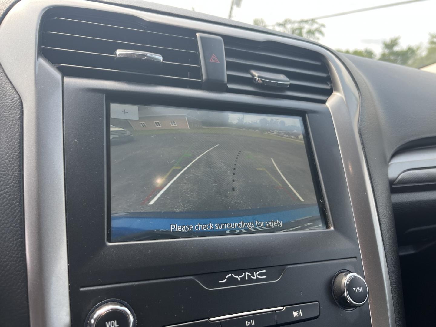2020 Blue /Black Ford Fusion SE AWD (3FA6P0T99LR) with an 2.0L I4 DOHC 16V Turbo engine, Automatic transmission, located at 11115 Chardon Rd. , Chardon, OH, 44024, (440) 214-9705, 41.580246, -81.241943 - 2020 Ford Fusion SE AWD – Efficient Turbo Sedan with Fresh Tires and Advanced Safety Features! This 2020 Ford Fusion SE AWD is a stylish and capable midsize sedan that offers strong performance and confident all-weather handling. Powered by a responsive 2.0L Turbocharged EcoBoost I4 engine paired- Photo#25