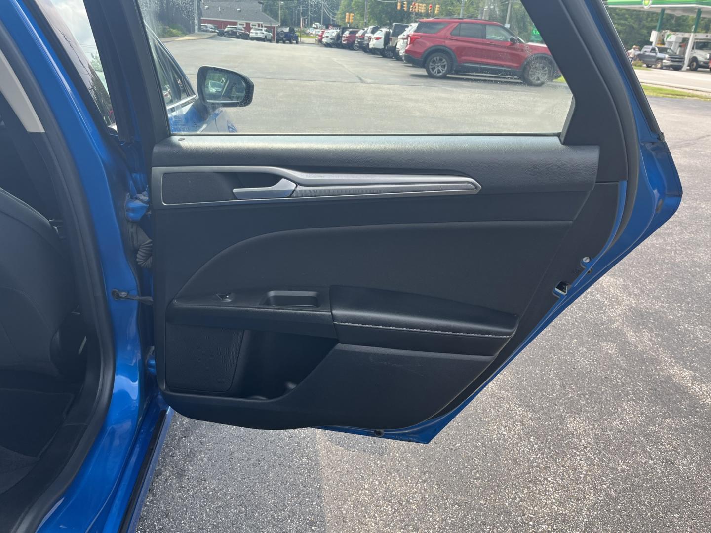 2020 Blue /Black Ford Fusion SE AWD (3FA6P0T99LR) with an 2.0L I4 DOHC 16V Turbo engine, Automatic transmission, located at 11115 Chardon Rd. , Chardon, OH, 44024, (440) 214-9705, 41.580246, -81.241943 - 2020 Ford Fusion SE AWD – Efficient Turbo Sedan with Fresh Tires and Advanced Safety Features! This 2020 Ford Fusion SE AWD is a stylish and capable midsize sedan that offers strong performance and confident all-weather handling. Powered by a responsive 2.0L Turbocharged EcoBoost I4 engine paired- Photo#31