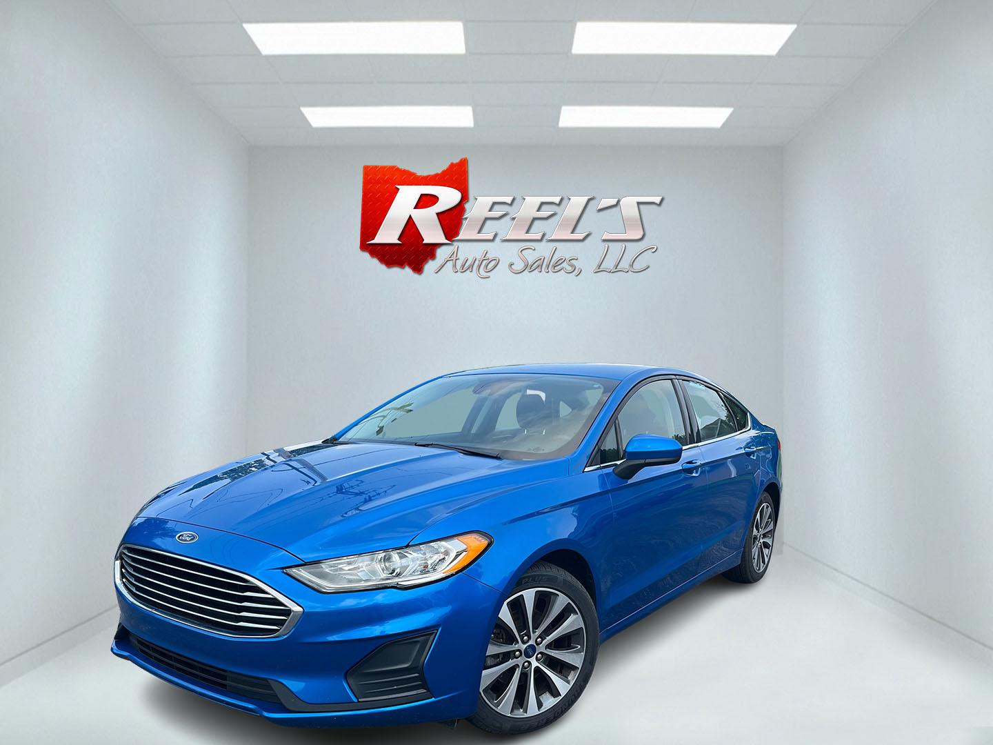 2020 Blue /Black Ford Fusion SE AWD (3FA6P0T99LR) with an 2.0L I4 DOHC 16V Turbo engine, Automatic transmission, located at 11115 Chardon Rd. , Chardon, OH, 44024, (440) 214-9705, 41.580246, -81.241943 - 2020 Ford Fusion SE AWD – Efficient Turbo Sedan with Fresh Tires and Advanced Safety Features! This 2020 Ford Fusion SE AWD is a stylish and capable midsize sedan that offers strong performance and confident all-weather handling. Powered by a responsive 2.0L Turbocharged EcoBoost I4 engine paired- Photo#0