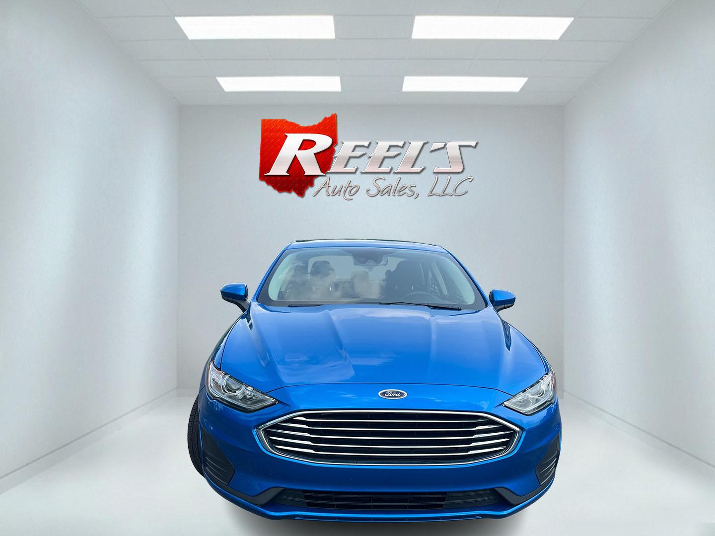2020 Blue /Black Ford Fusion SE AWD (3FA6P0T99LR) with an 2.0L I4 DOHC 16V Turbo engine, Automatic transmission, located at 11115 Chardon Rd. , Chardon, OH, 44024, (440) 214-9705, 41.580246, -81.241943 - 2020 Ford Fusion SE AWD – Efficient Turbo Sedan with Fresh Tires and Advanced Safety Features! This 2020 Ford Fusion SE AWD is a stylish and capable midsize sedan that offers strong performance and confident all-weather handling. Powered by a responsive 2.0L Turbocharged EcoBoost I4 engine paired- Photo#1