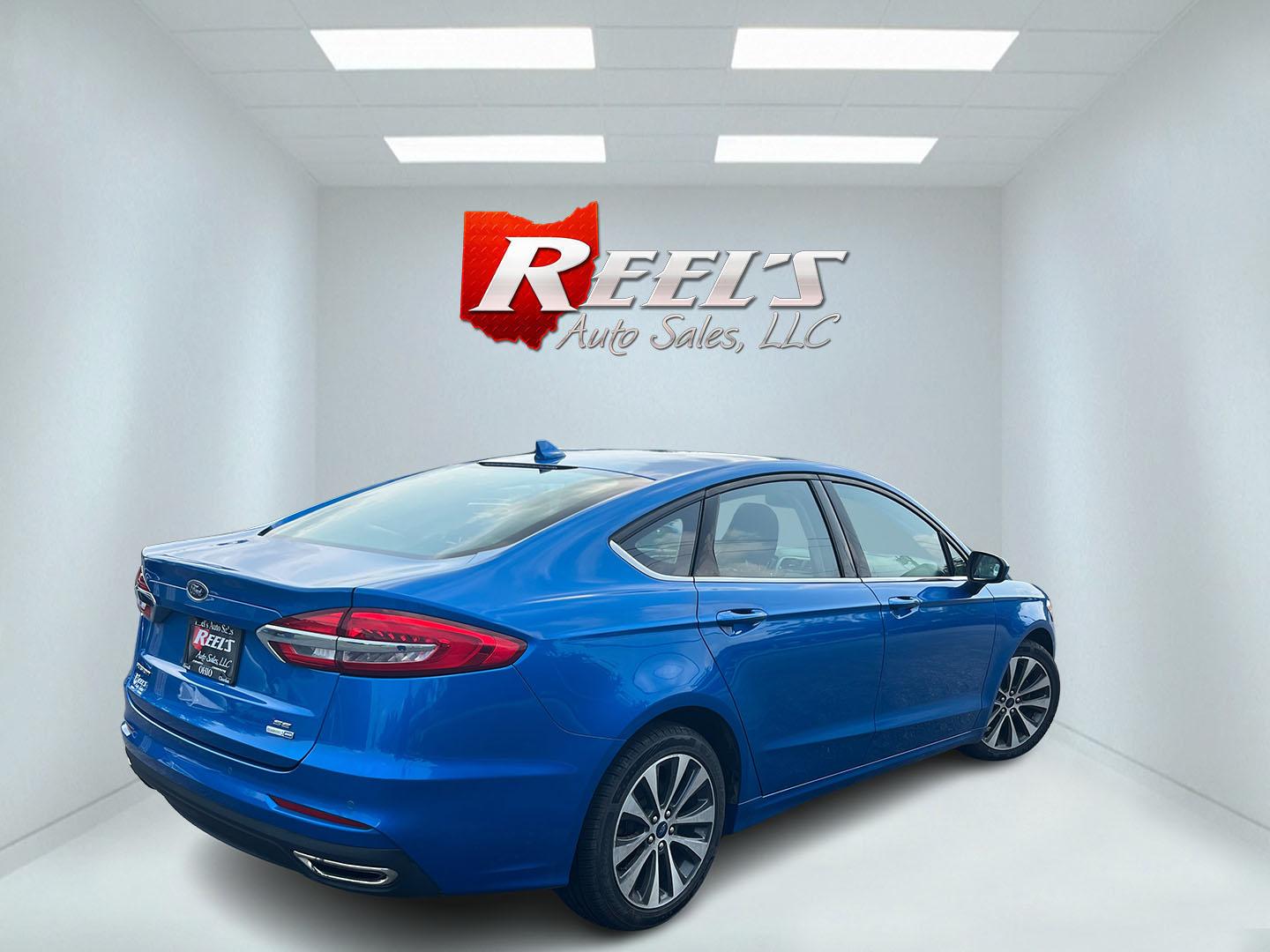 2020 Blue /Black Ford Fusion SE AWD (3FA6P0T99LR) with an 2.0L I4 DOHC 16V Turbo engine, Automatic transmission, located at 11115 Chardon Rd. , Chardon, OH, 44024, (440) 214-9705, 41.580246, -81.241943 - 2020 Ford Fusion SE AWD – Efficient Turbo Sedan with Fresh Tires and Advanced Safety Features! This 2020 Ford Fusion SE AWD is a stylish and capable midsize sedan that offers strong performance and confident all-weather handling. Powered by a responsive 2.0L Turbocharged EcoBoost I4 engine paired- Photo#6