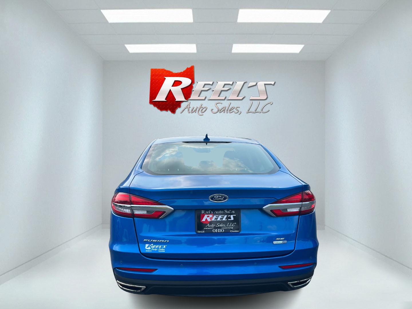 2020 Blue /Black Ford Fusion SE AWD (3FA6P0T99LR) with an 2.0L I4 DOHC 16V Turbo engine, Automatic transmission, located at 11115 Chardon Rd. , Chardon, OH, 44024, (440) 214-9705, 41.580246, -81.241943 - 2020 Ford Fusion SE AWD – Efficient Turbo Sedan with Fresh Tires and Advanced Safety Features! This 2020 Ford Fusion SE AWD is a stylish and capable midsize sedan that offers strong performance and confident all-weather handling. Powered by a responsive 2.0L Turbocharged EcoBoost I4 engine paired- Photo#8
