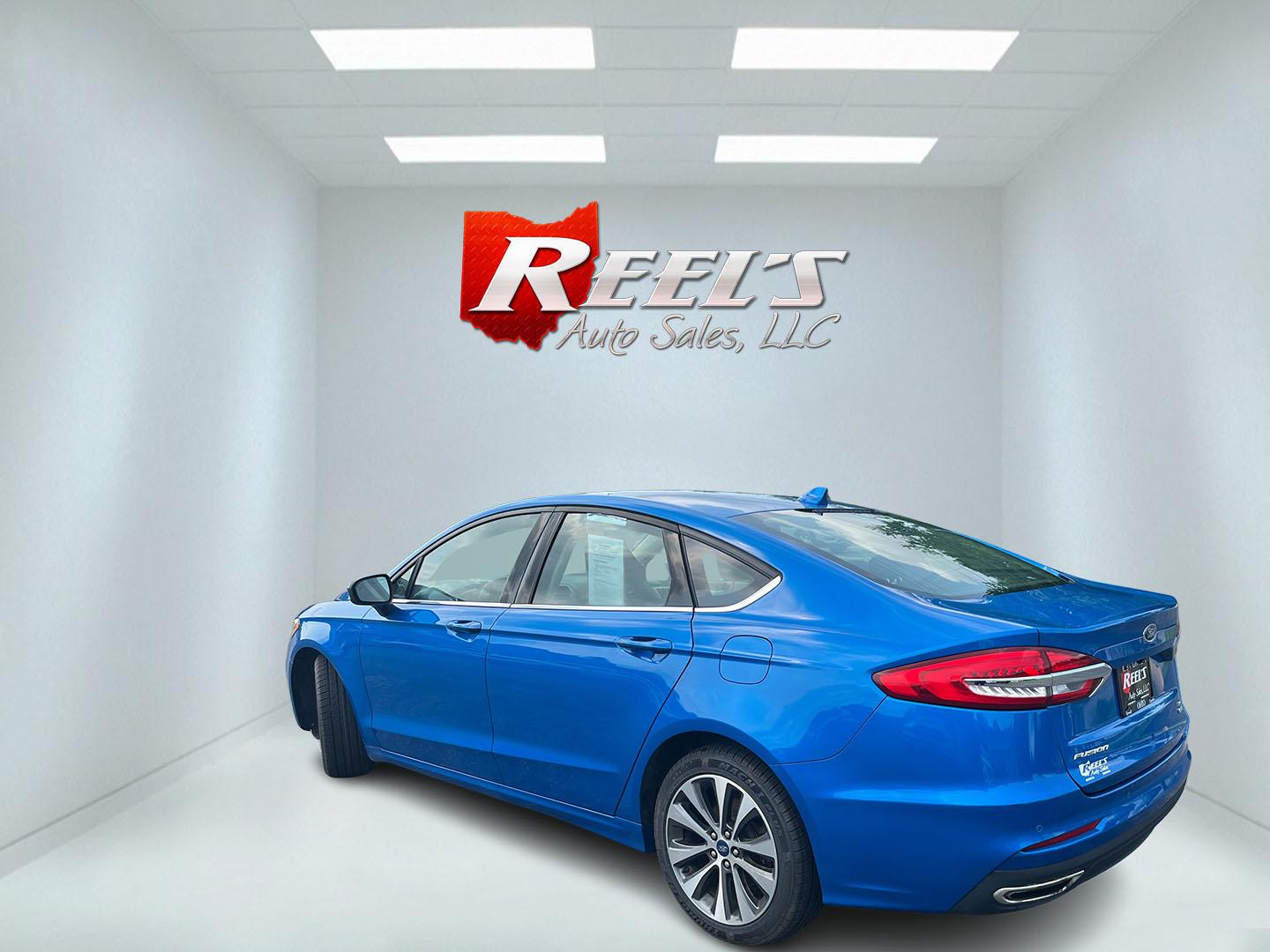 2020 Blue /Black Ford Fusion SE AWD (3FA6P0T99LR) with an 2.0L I4 DOHC 16V Turbo engine, Automatic transmission, located at 11115 Chardon Rd. , Chardon, OH, 44024, (440) 214-9705, 41.580246, -81.241943 - 2020 Ford Fusion SE AWD – Efficient Turbo Sedan with Fresh Tires and Advanced Safety Features! This 2020 Ford Fusion SE AWD is a stylish and capable midsize sedan that offers strong performance and confident all-weather handling. Powered by a responsive 2.0L Turbocharged EcoBoost I4 engine paired- Photo#9