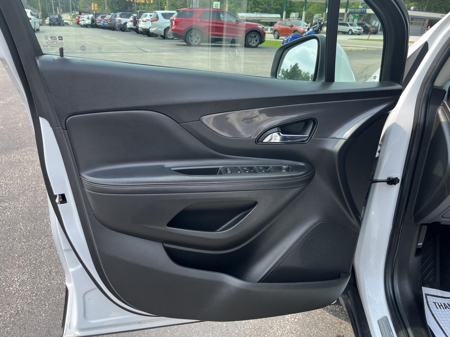 2020 White /Black Buick Encore Preferred AWD (KL4CJESB3LB) with an 1.4L I4 DOHC 16V TURBO engine, Automatic transmission, located at 11115 Chardon Rd. , Chardon, OH, 44024, (440) 214-9705, 41.580246, -81.241943 - 2020 Buick Encore Preferred AWD – Small Footprint, Refined Feel Not every driver needs a large SUV. This 2020 Buick Encore Preferred AWD proves that a compact crossover can still feel upscale and capable. The 1.4L Turbocharged EcoTec engine and 6-speed automatic provide smooth, efficient power, r- Photo#16