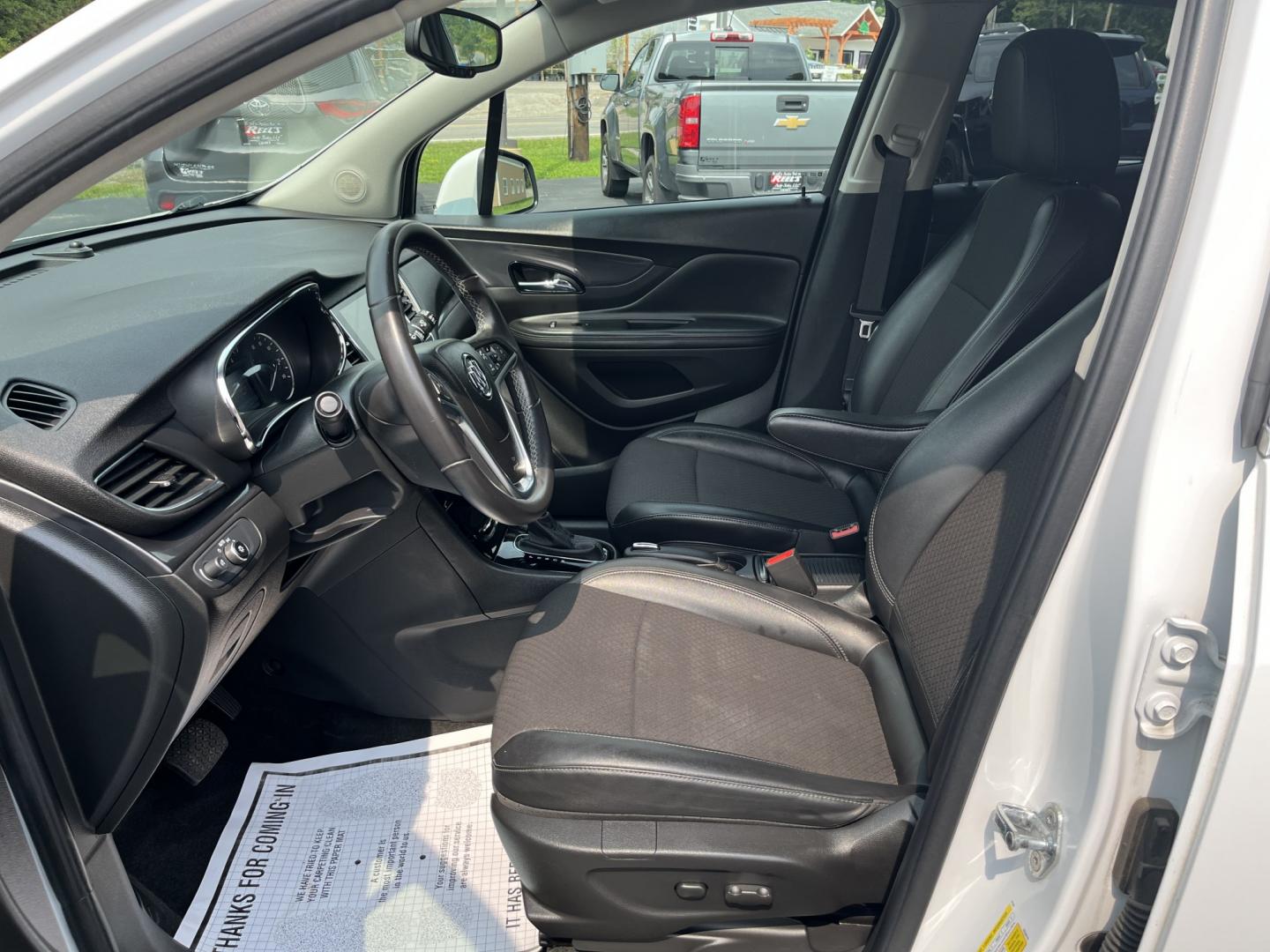 2020 White /Black Buick Encore Preferred AWD (KL4CJESB3LB) with an 1.4L I4 DOHC 16V TURBO engine, Automatic transmission, located at 11115 Chardon Rd. , Chardon, OH, 44024, (440) 214-9705, 41.580246, -81.241943 - 2020 Buick Encore Preferred AWD – Small Footprint, Refined Feel Not every driver needs a large SUV. This 2020 Buick Encore Preferred AWD proves that a compact crossover can still feel upscale and capable. The 1.4L Turbocharged EcoTec engine and 6-speed automatic provide smooth, efficient power, r- Photo#18