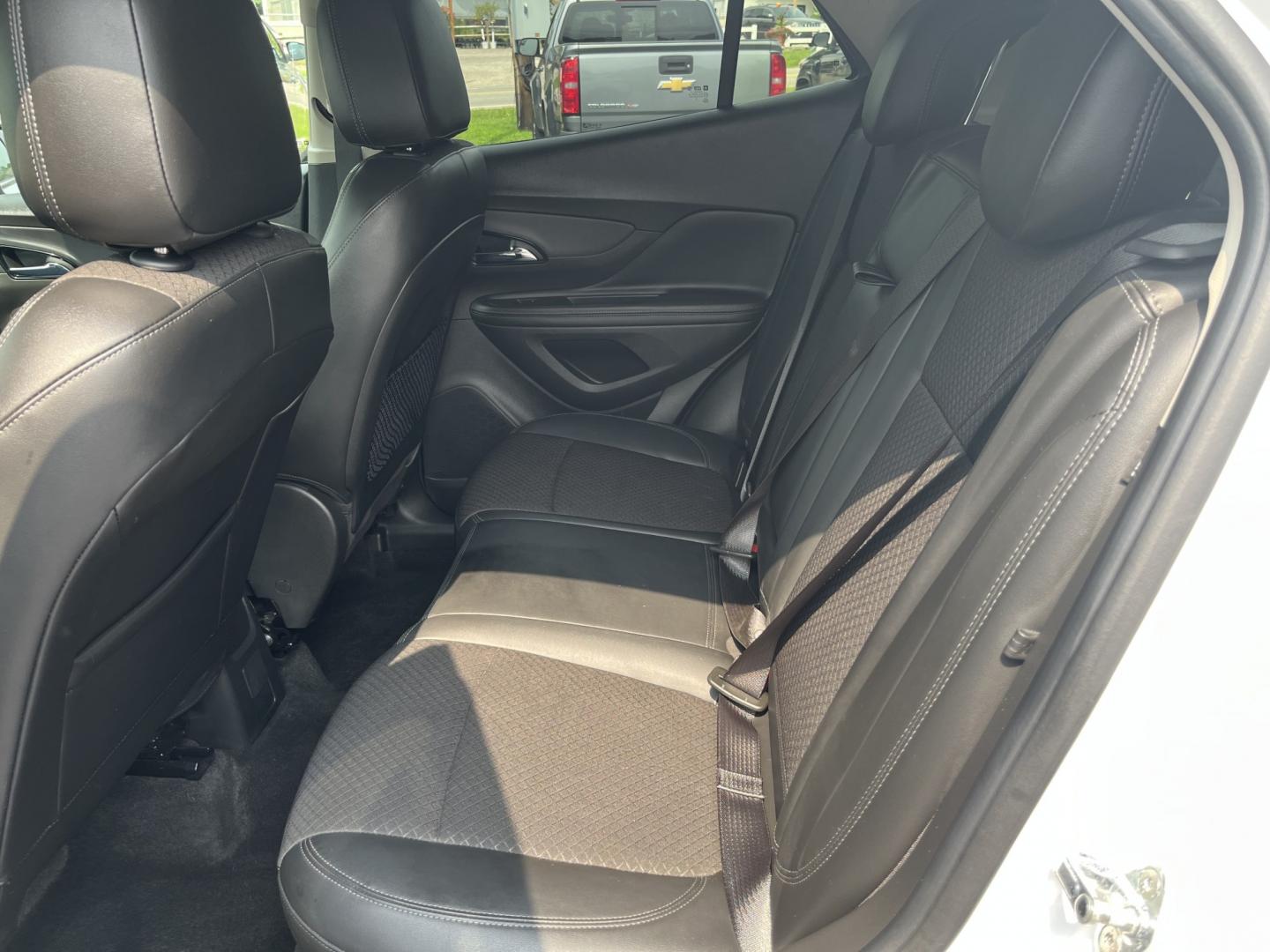 2020 White /Black Buick Encore Preferred AWD (KL4CJESB3LB) with an 1.4L I4 DOHC 16V TURBO engine, Automatic transmission, located at 11115 Chardon Rd. , Chardon, OH, 44024, (440) 214-9705, 41.580246, -81.241943 - 2020 Buick Encore Preferred AWD – Small Footprint, Refined Feel Not every driver needs a large SUV. This 2020 Buick Encore Preferred AWD proves that a compact crossover can still feel upscale and capable. The 1.4L Turbocharged EcoTec engine and 6-speed automatic provide smooth, efficient power, r- Photo#30