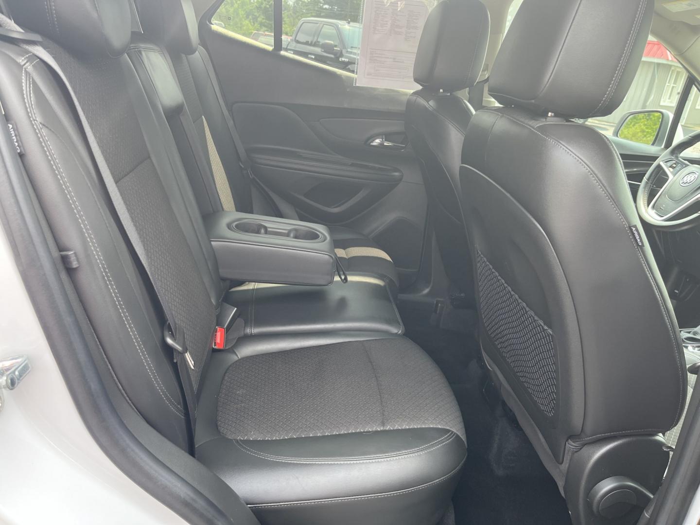 2020 White /Black Buick Encore Preferred AWD (KL4CJESB3LB) with an 1.4L I4 DOHC 16V TURBO engine, Automatic transmission, located at 11115 Chardon Rd. , Chardon, OH, 44024, (440) 214-9705, 41.580246, -81.241943 - 2020 Buick Encore Preferred AWD – Small Footprint, Refined Feel Not every driver needs a large SUV. This 2020 Buick Encore Preferred AWD proves that a compact crossover can still feel upscale and capable. The 1.4L Turbocharged EcoTec engine and 6-speed automatic provide smooth, efficient power, r- Photo#33