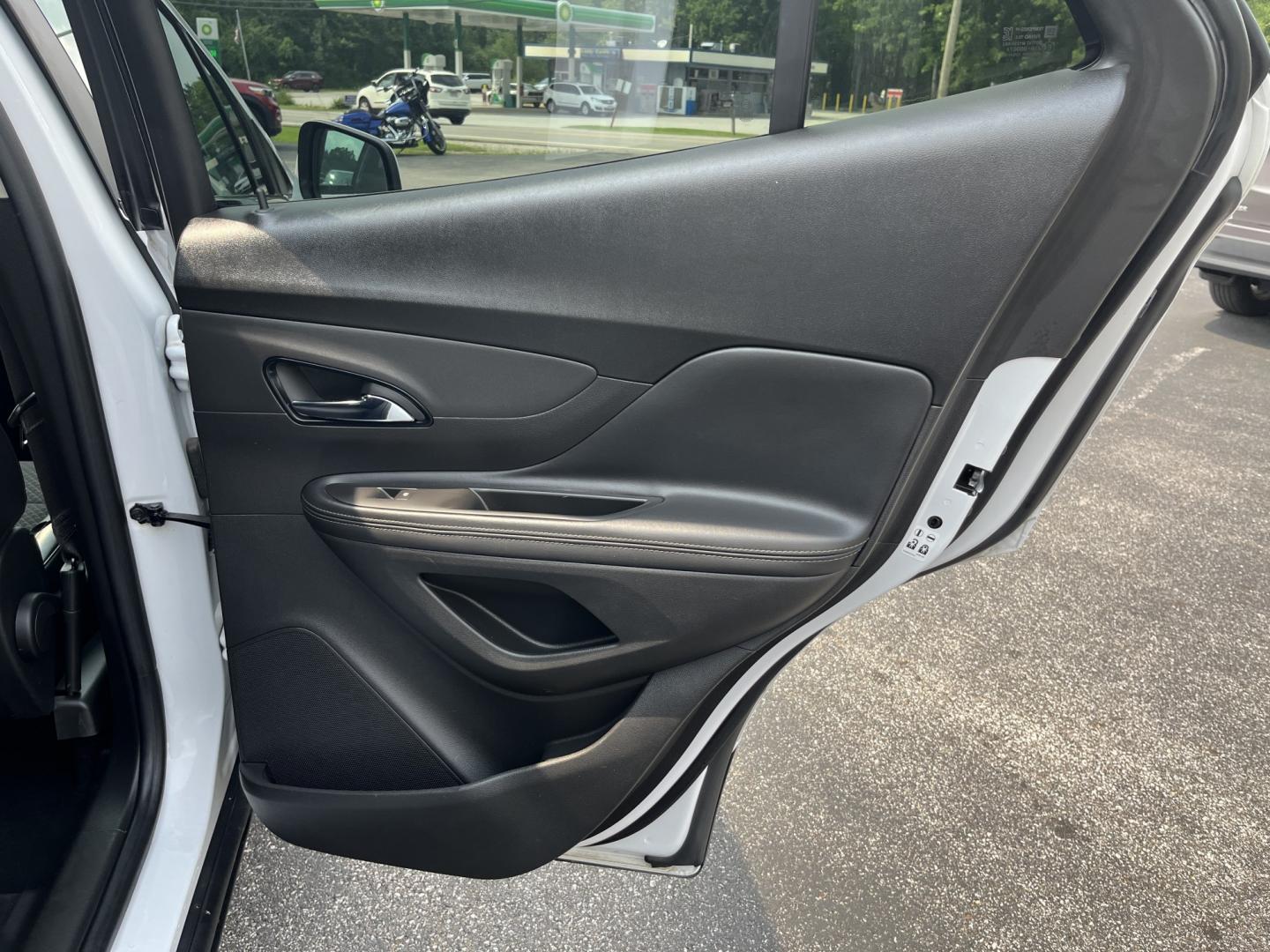 2020 White /Black Buick Encore Preferred AWD (KL4CJESB3LB) with an 1.4L I4 DOHC 16V TURBO engine, Automatic transmission, located at 11115 Chardon Rd. , Chardon, OH, 44024, (440) 214-9705, 41.580246, -81.241943 - 2020 Buick Encore Preferred AWD – Small Footprint, Refined Feel Not every driver needs a large SUV. This 2020 Buick Encore Preferred AWD proves that a compact crossover can still feel upscale and capable. The 1.4L Turbocharged EcoTec engine and 6-speed automatic provide smooth, efficient power, r- Photo#32