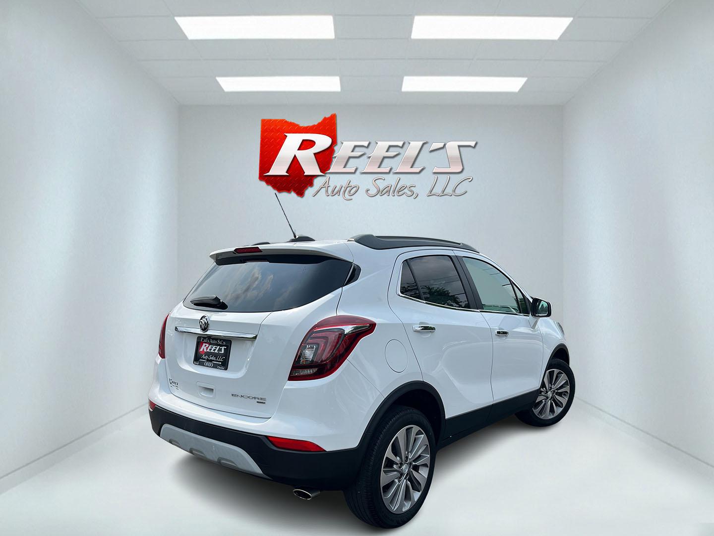 2020 White /Black Buick Encore Preferred AWD (KL4CJESB3LB) with an 1.4L I4 DOHC 16V TURBO engine, Automatic transmission, located at 11115 Chardon Rd. , Chardon, OH, 44024, (440) 214-9705, 41.580246, -81.241943 - 2020 Buick Encore Preferred AWD – Small Footprint, Refined Feel Not every driver needs a large SUV. This 2020 Buick Encore Preferred AWD proves that a compact crossover can still feel upscale and capable. The 1.4L Turbocharged EcoTec engine and 6-speed automatic provide smooth, efficient power, r- Photo#7