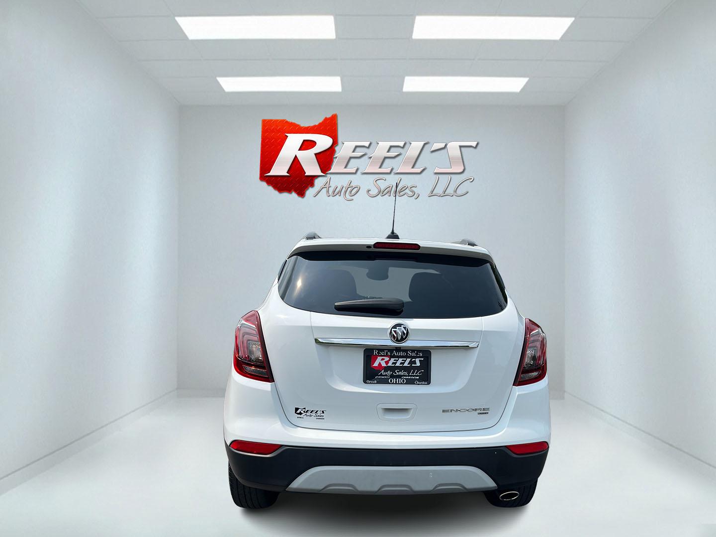 2020 White /Black Buick Encore Preferred AWD (KL4CJESB3LB) with an 1.4L I4 DOHC 16V TURBO engine, Automatic transmission, located at 11115 Chardon Rd. , Chardon, OH, 44024, (440) 214-9705, 41.580246, -81.241943 - 2020 Buick Encore Preferred AWD – Small Footprint, Refined Feel Not every driver needs a large SUV. This 2020 Buick Encore Preferred AWD proves that a compact crossover can still feel upscale and capable. The 1.4L Turbocharged EcoTec engine and 6-speed automatic provide smooth, efficient power, r- Photo#9