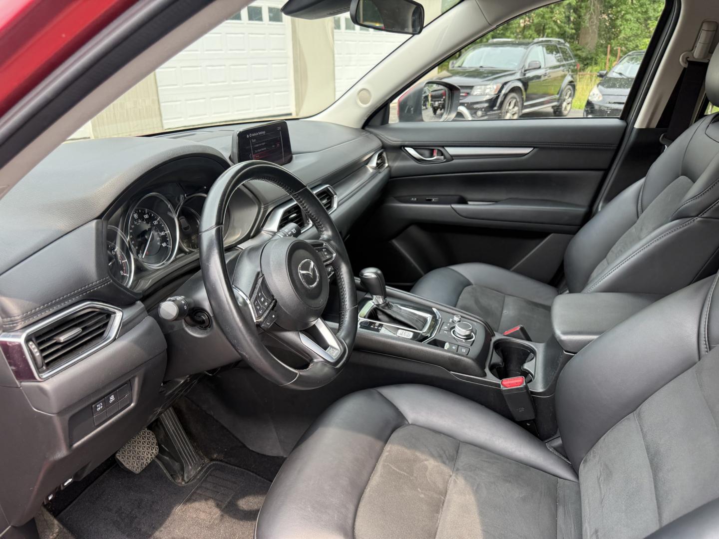 2019 Red /Black Mazda CX-5 Touring AWD (JM3KFBCM1K1) with an 2.5L I4 DOHC 16V engine, Automatic transmission, located at 547 E. Main St., Orwell, OH, 44076, (440) 437-5893, 41.535435, -80.847855 - 2019 Mazda CX-5 Touring AWD – The Compact SUV That Feels a Step Above Some crossovers simply check boxes. This 2019 Mazda CX-5 Touring AWD does more than that — it feels carefully designed. The 2.5L engine and 6-speed automatic work together smoothly, while available AWD gives you confidence wh- Photo#6