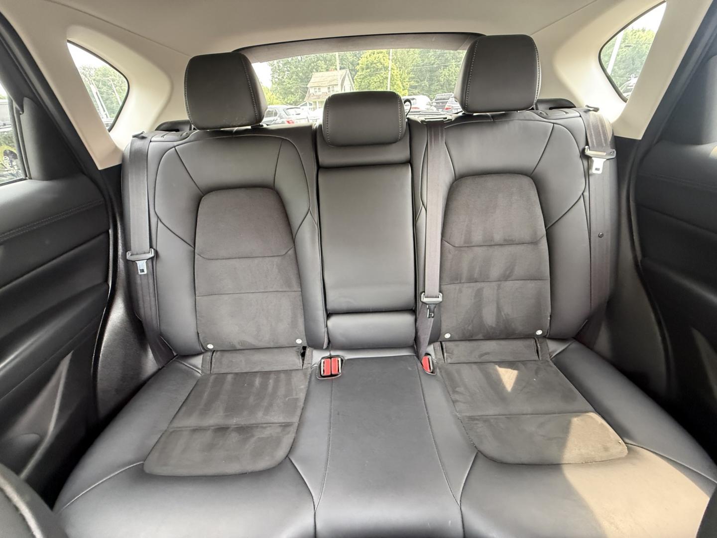 2019 Red /Black Mazda CX-5 Touring AWD (JM3KFBCM1K1) with an 2.5L I4 DOHC 16V engine, Automatic transmission, located at 547 E. Main St., Orwell, OH, 44076, (440) 437-5893, 41.535435, -80.847855 - 2019 Mazda CX-5 Touring AWD – The Compact SUV That Feels a Step Above Some crossovers simply check boxes. This 2019 Mazda CX-5 Touring AWD does more than that — it feels carefully designed. The 2.5L engine and 6-speed automatic work together smoothly, while available AWD gives you confidence wh- Photo#20
