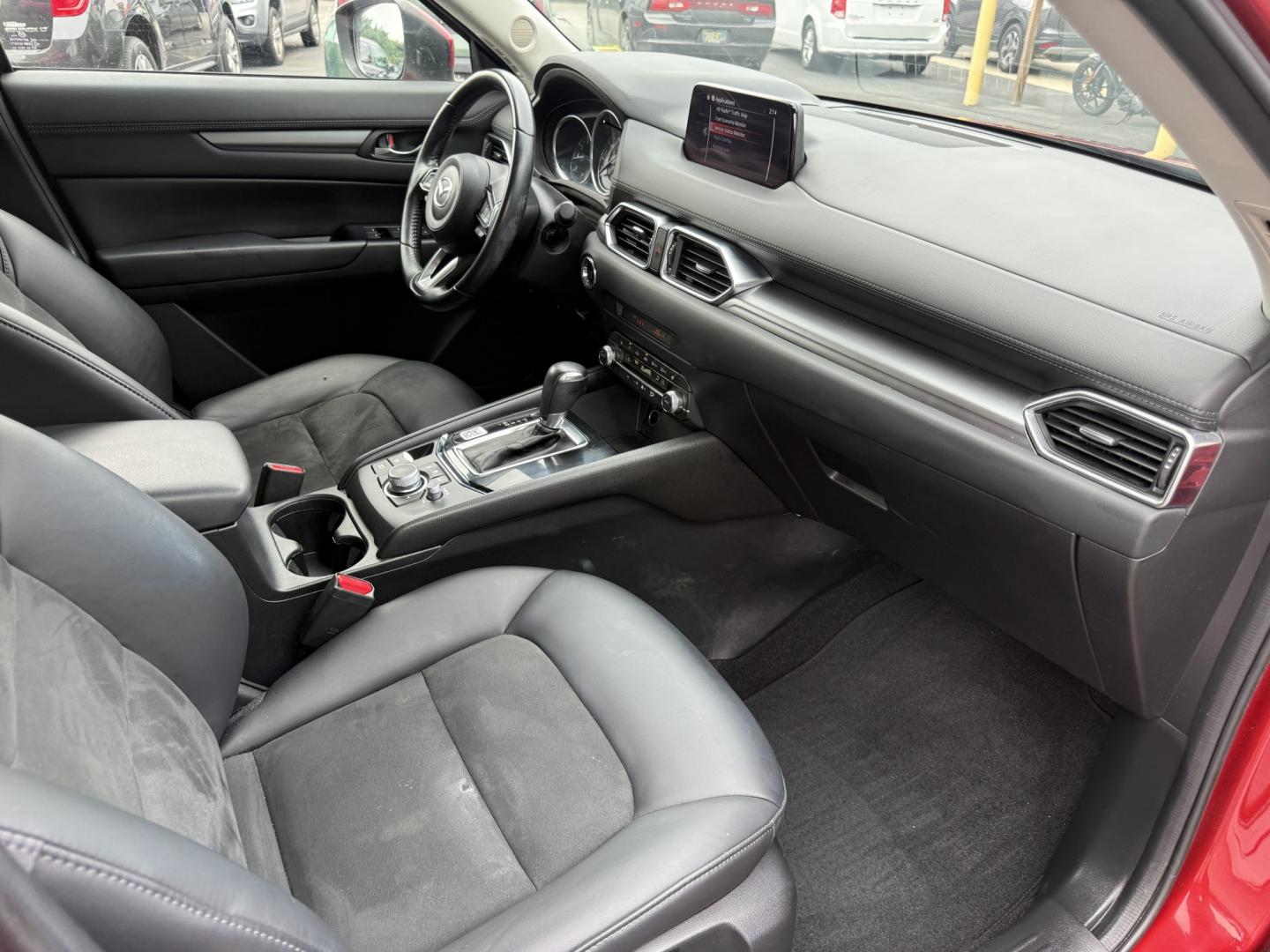 2019 Red /Black Mazda CX-5 Touring AWD (JM3KFBCM1K1) with an 2.5L I4 DOHC 16V engine, Automatic transmission, located at 547 E. Main St., Orwell, OH, 44076, (440) 437-5893, 41.535435, -80.847855 - 2019 Mazda CX-5 Touring AWD – The Compact SUV That Feels a Step Above Some crossovers simply check boxes. This 2019 Mazda CX-5 Touring AWD does more than that — it feels carefully designed. The 2.5L engine and 6-speed automatic work together smoothly, while available AWD gives you confidence wh- Photo#37