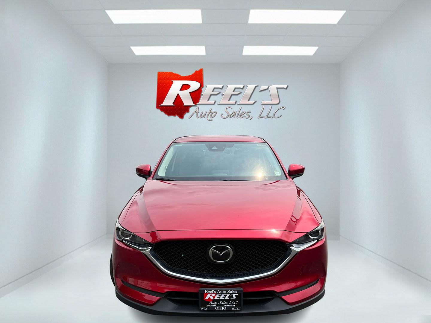 2019 Red /Black Mazda CX-5 Touring AWD (JM3KFBCM1K1) with an 2.5L I4 DOHC 16V engine, Automatic transmission, located at 547 E. Main St., Orwell, OH, 44076, (440) 437-5893, 41.535435, -80.847855 - 2019 Mazda CX-5 Touring AWD – The Compact SUV That Feels a Step Above Some crossovers simply check boxes. This 2019 Mazda CX-5 Touring AWD does more than that — it feels carefully designed. The 2.5L engine and 6-speed automatic work together smoothly, while available AWD gives you confidence wh- Photo#2