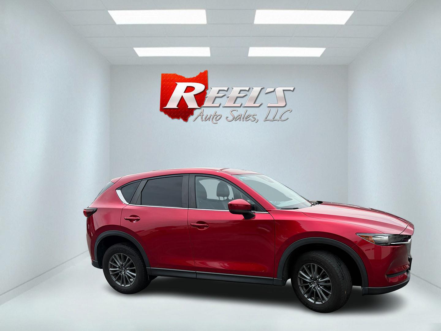 2019 Red /Black Mazda CX-5 Touring AWD (JM3KFBCM1K1) with an 2.5L I4 DOHC 16V engine, Automatic transmission, located at 547 E. Main St., Orwell, OH, 44076, (440) 437-5893, 41.535435, -80.847855 - 2019 Mazda CX-5 Touring AWD – The Compact SUV That Feels a Step Above Some crossovers simply check boxes. This 2019 Mazda CX-5 Touring AWD does more than that — it feels carefully designed. The 2.5L engine and 6-speed automatic work together smoothly, while available AWD gives you confidence wh- Photo#4