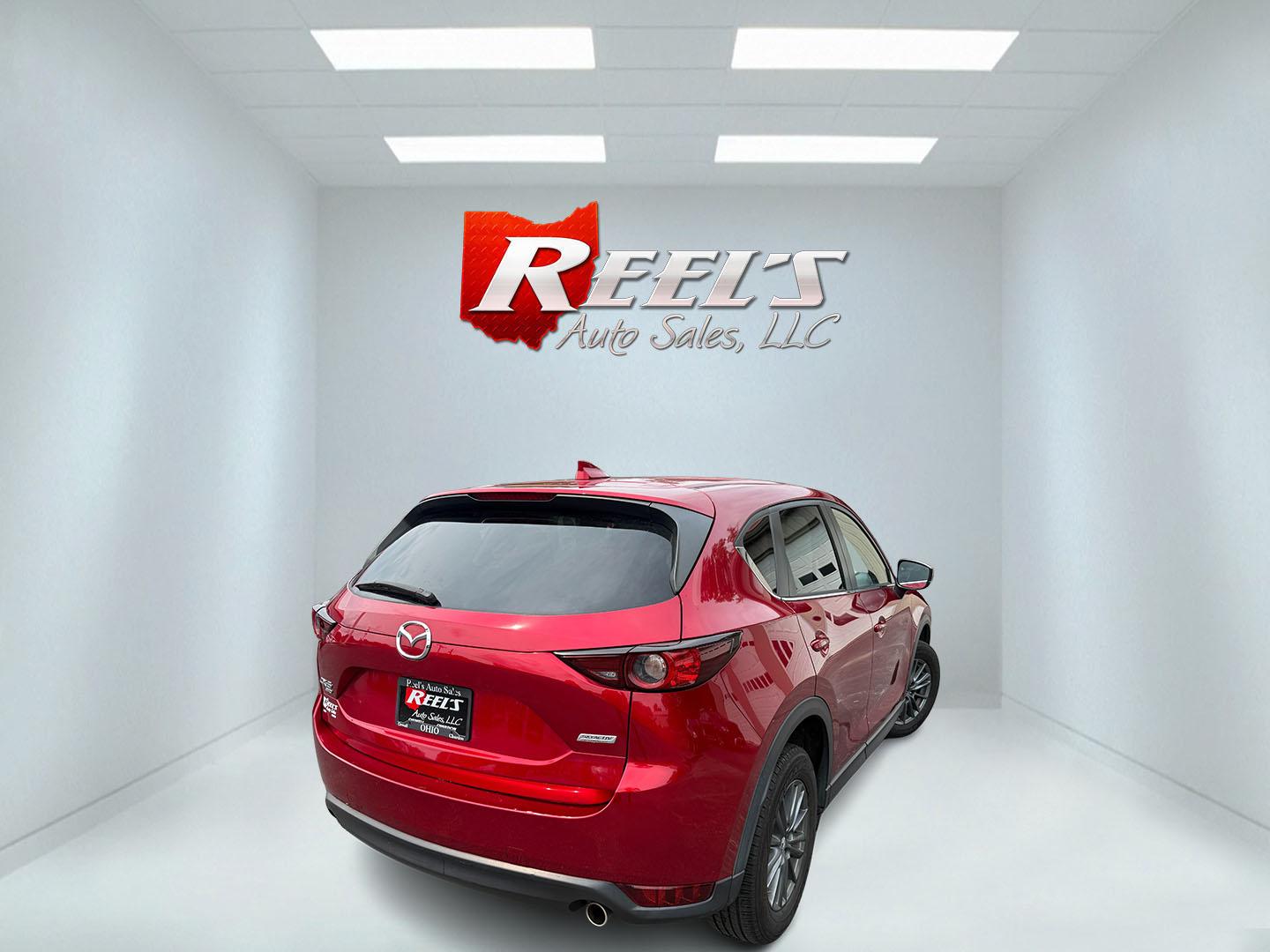2019 Red /Black Mazda CX-5 Touring AWD (JM3KFBCM1K1) with an 2.5L I4 DOHC 16V engine, Automatic transmission, located at 547 E. Main St., Orwell, OH, 44076, (440) 437-5893, 41.535435, -80.847855 - 2019 Mazda CX-5 Touring AWD – The Compact SUV That Feels a Step Above Some crossovers simply check boxes. This 2019 Mazda CX-5 Touring AWD does more than that — it feels carefully designed. The 2.5L engine and 6-speed automatic work together smoothly, while available AWD gives you confidence wh- Photo#27