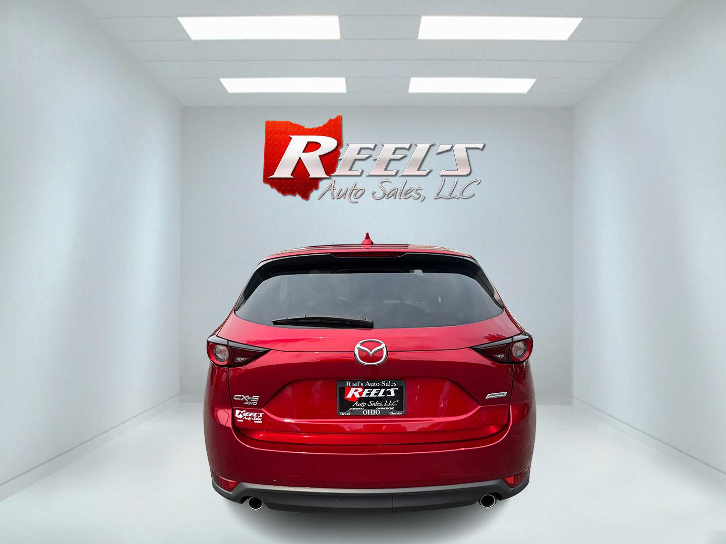 2019 Red /Black Mazda CX-5 Touring AWD (JM3KFBCM1K1) with an 2.5L I4 DOHC 16V engine, Automatic transmission, located at 547 E. Main St., Orwell, OH, 44076, (440) 437-5893, 41.535435, -80.847855 - 2019 Mazda CX-5 Touring AWD – The Compact SUV That Feels a Step Above Some crossovers simply check boxes. This 2019 Mazda CX-5 Touring AWD does more than that — it feels carefully designed. The 2.5L engine and 6-speed automatic work together smoothly, while available AWD gives you confidence wh- Photo#28