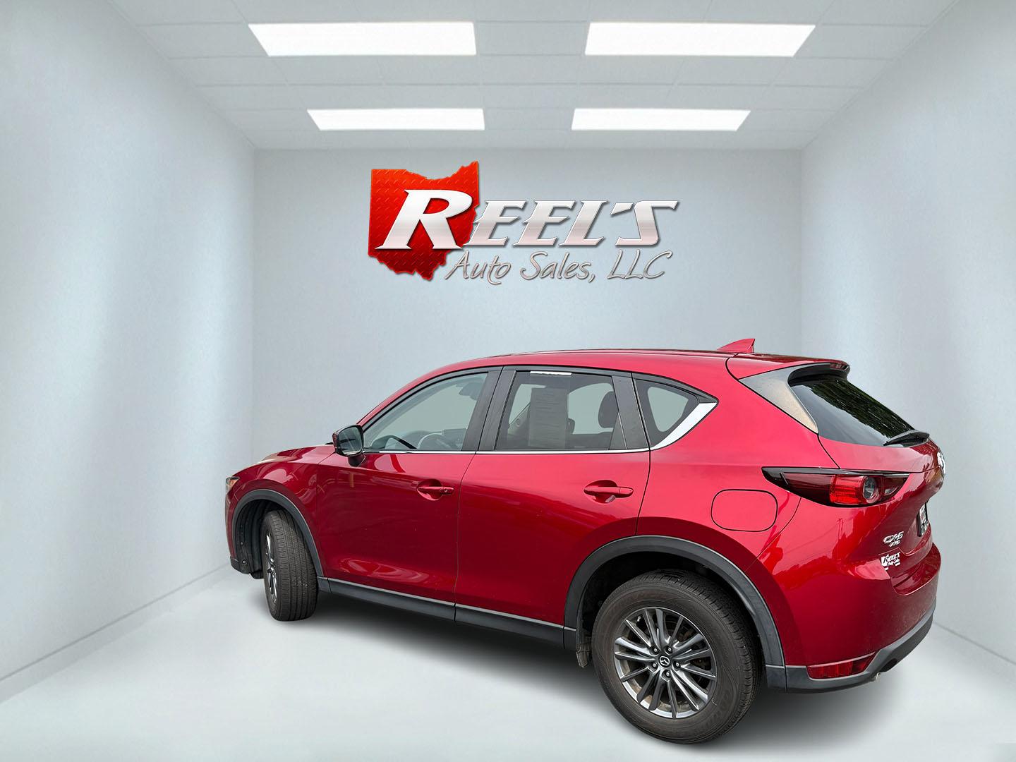 2019 Red /Black Mazda CX-5 Touring AWD (JM3KFBCM1K1) with an 2.5L I4 DOHC 16V engine, Automatic transmission, located at 547 E. Main St., Orwell, OH, 44076, (440) 437-5893, 41.535435, -80.847855 - 2019 Mazda CX-5 Touring AWD – The Compact SUV That Feels a Step Above Some crossovers simply check boxes. This 2019 Mazda CX-5 Touring AWD does more than that — it feels carefully designed. The 2.5L engine and 6-speed automatic work together smoothly, while available AWD gives you confidence wh- Photo#30