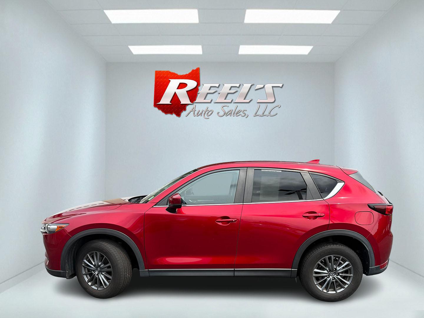 2019 Red /Black Mazda CX-5 Touring AWD (JM3KFBCM1K1) with an 2.5L I4 DOHC 16V engine, Automatic transmission, located at 547 E. Main St., Orwell, OH, 44076, (440) 437-5893, 41.535435, -80.847855 - 2019 Mazda CX-5 Touring AWD – The Compact SUV That Feels a Step Above Some crossovers simply check boxes. This 2019 Mazda CX-5 Touring AWD does more than that — it feels carefully designed. The 2.5L engine and 6-speed automatic work together smoothly, while available AWD gives you confidence wh- Photo#32
