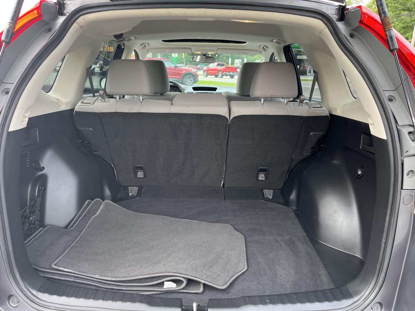 2015 Gray /Gray Honda CR-V EX 4WD (5J6RM4H56FL) with an 2.4L I4 DOHC 16V engine, Automatic transmission, located at 11115 Chardon Rd. , Chardon, OH, 44024, (440) 214-9705, 41.580246, -81.241943 - 2015 Honda CR-V EX AWD – The Compact SUV That Quietly Earns Your Trust Some vehicles just make everyday life feel easier. This 2015 Honda CR-V EX AWD is one of them. With its reliable 2.4L K24 engine, available ECO Mode, and capable AWD, it delivers confident all-weather performance and a strong- Photo#14