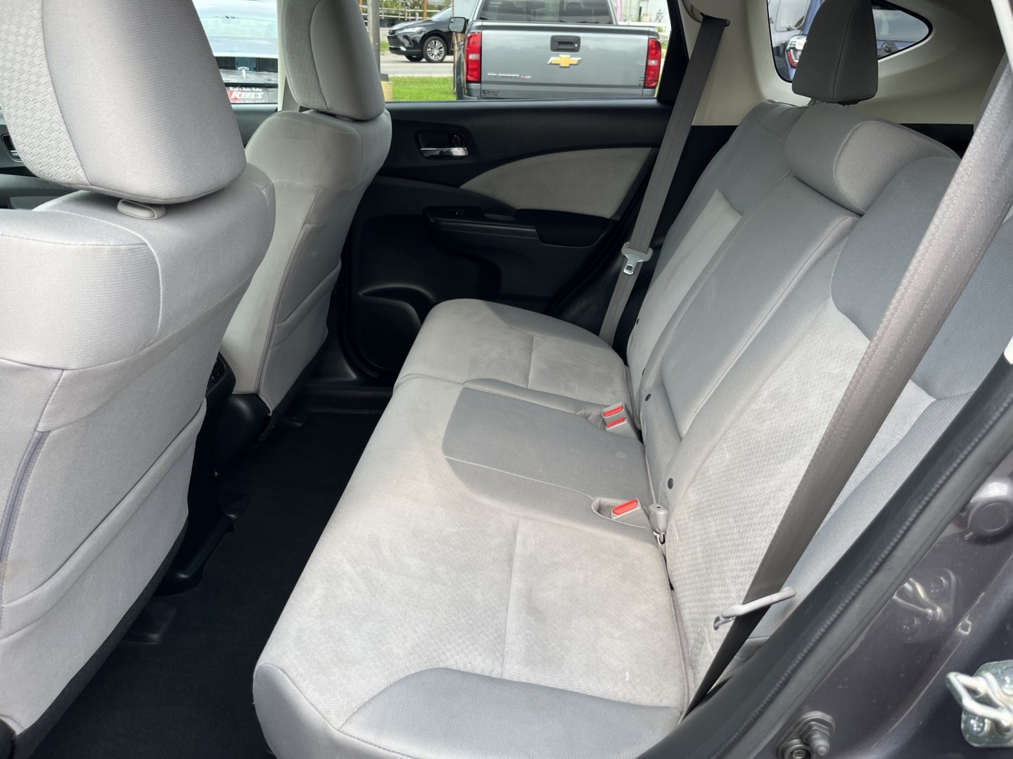 2015 Gray /Gray Honda CR-V EX 4WD (5J6RM4H56FL) with an 2.4L I4 DOHC 16V engine, Automatic transmission, located at 11115 Chardon Rd. , Chardon, OH, 44024, (440) 214-9705, 41.580246, -81.241943 - 2015 Honda CR-V EX AWD – The Compact SUV That Quietly Earns Your Trust Some vehicles just make everyday life feel easier. This 2015 Honda CR-V EX AWD is one of them. With its reliable 2.4L K24 engine, available ECO Mode, and capable AWD, it delivers confident all-weather performance and a strong- Photo#29