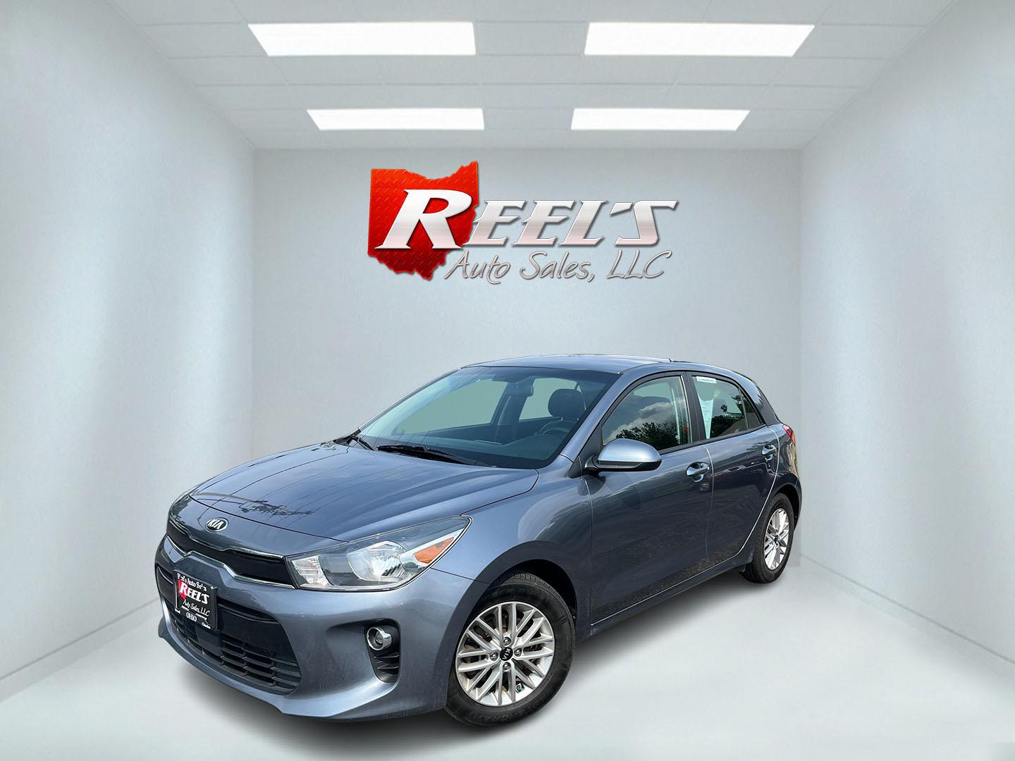 2018 Gray /Black Kia Rio5 EX (3KPA35AB8JE) with an 1.6L I4 DOHC 16V engine, Automatic transmission, located at 11115 Chardon Rd. , Chardon, OH, 44024, (440) 214-9705, 41.580246, -81.241943 - 2018 Kia Rio EX Hatchback Launch Edition – Stylish, Efficient, and Surprisingly Refined Looking for a compact car that feels a step above the ordinary? This 2018 Kia Rio EX Hatchback Launch Edition delivers exactly that. Powered by a responsive 1.6L GDI engine and smooth 6-speed automatic, it ret- Photo#0