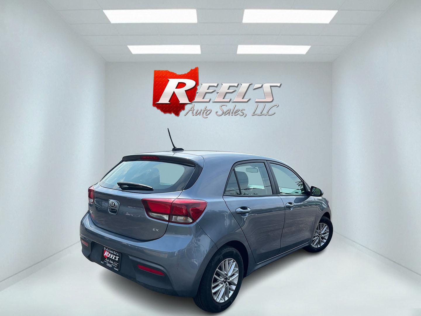 2018 Gray /Black Kia Rio5 EX (3KPA35AB8JE) with an 1.6L I4 DOHC 16V engine, Automatic transmission, located at 11115 Chardon Rd. , Chardon, OH, 44024, (440) 214-9705, 41.580246, -81.241943 - 2018 Kia Rio EX Hatchback Launch Edition – Stylish, Efficient, and Surprisingly Refined Looking for a compact car that feels a step above the ordinary? This 2018 Kia Rio EX Hatchback Launch Edition delivers exactly that. Powered by a responsive 1.6L GDI engine and smooth 6-speed automatic, it ret- Photo#7