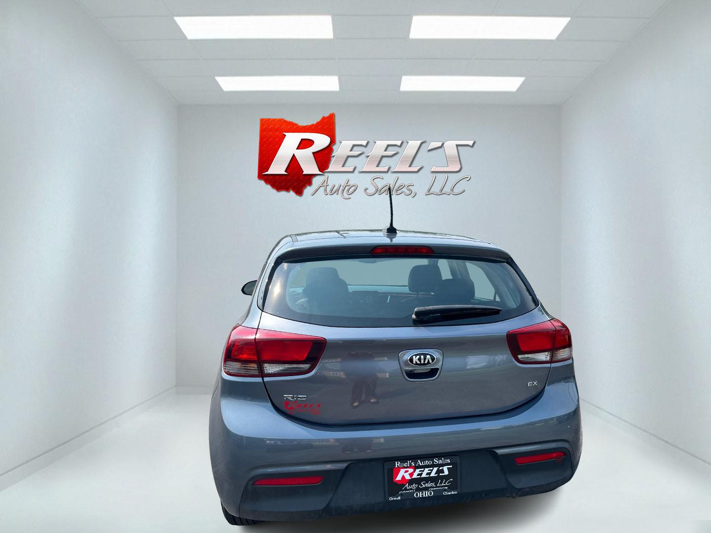 2018 Gray /Black Kia Rio5 EX (3KPA35AB8JE) with an 1.6L I4 DOHC 16V engine, Automatic transmission, located at 11115 Chardon Rd. , Chardon, OH, 44024, (440) 214-9705, 41.580246, -81.241943 - 2018 Kia Rio EX Hatchback Launch Edition – Stylish, Efficient, and Surprisingly Refined Looking for a compact car that feels a step above the ordinary? This 2018 Kia Rio EX Hatchback Launch Edition delivers exactly that. Powered by a responsive 1.6L GDI engine and smooth 6-speed automatic, it ret- Photo#9