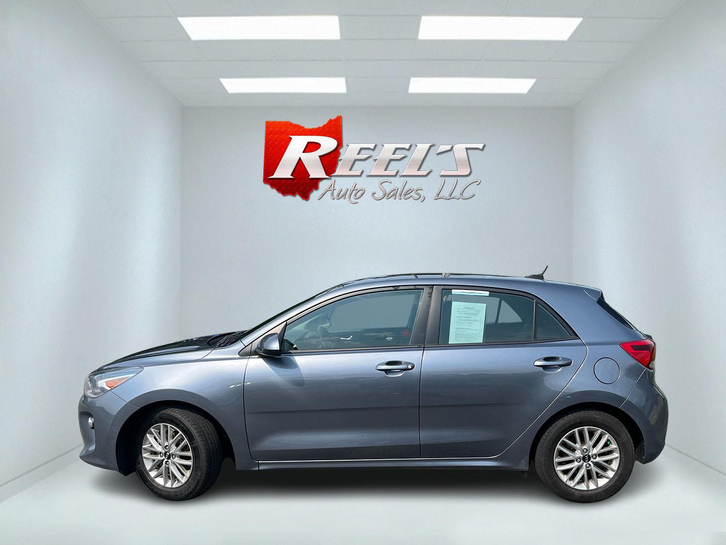 2018 Gray /Black Kia Rio5 EX (3KPA35AB8JE) with an 1.6L I4 DOHC 16V engine, Automatic transmission, located at 11115 Chardon Rd. , Chardon, OH, 44024, (440) 214-9705, 41.580246, -81.241943 - 2018 Kia Rio EX Hatchback Launch Edition – Stylish, Efficient, and Surprisingly Refined Looking for a compact car that feels a step above the ordinary? This 2018 Kia Rio EX Hatchback Launch Edition delivers exactly that. Powered by a responsive 1.6L GDI engine and smooth 6-speed automatic, it ret- Photo#12
