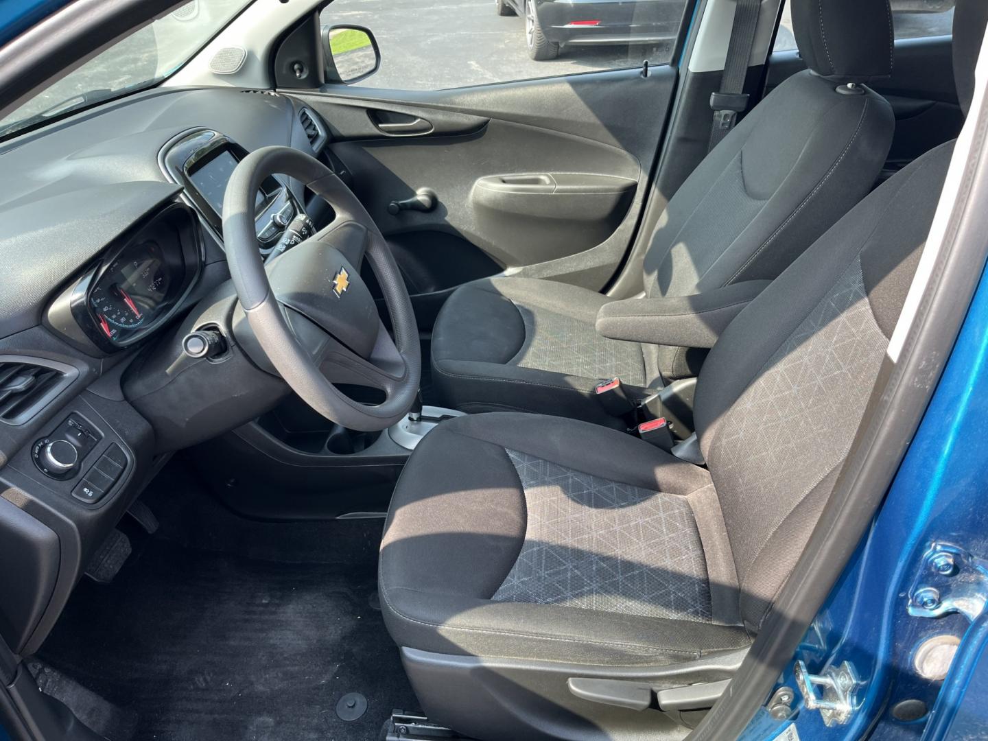 2020 Blue /Black Chevrolet Spark LS CVT (KL8CB6SA8LC) with an 1.4L I4 16V DOHC engine, Automatic transmission, located at 11115 Chardon Rd. , Chardon, OH, 44024, (440) 214-9705, 41.580246, -81.241943 - 2020 Chevrolet Spark LS – Small Car, Big Personality, and Excellent Efficiency Sometimes the best car is the one that makes everyday life simpler and more affordable. This 2020 Chevrolet Spark LS does exactly that. Powered by a lively 1.4L EcoTec engine, it delivers an impressive 38 MPG highway a- Photo#16