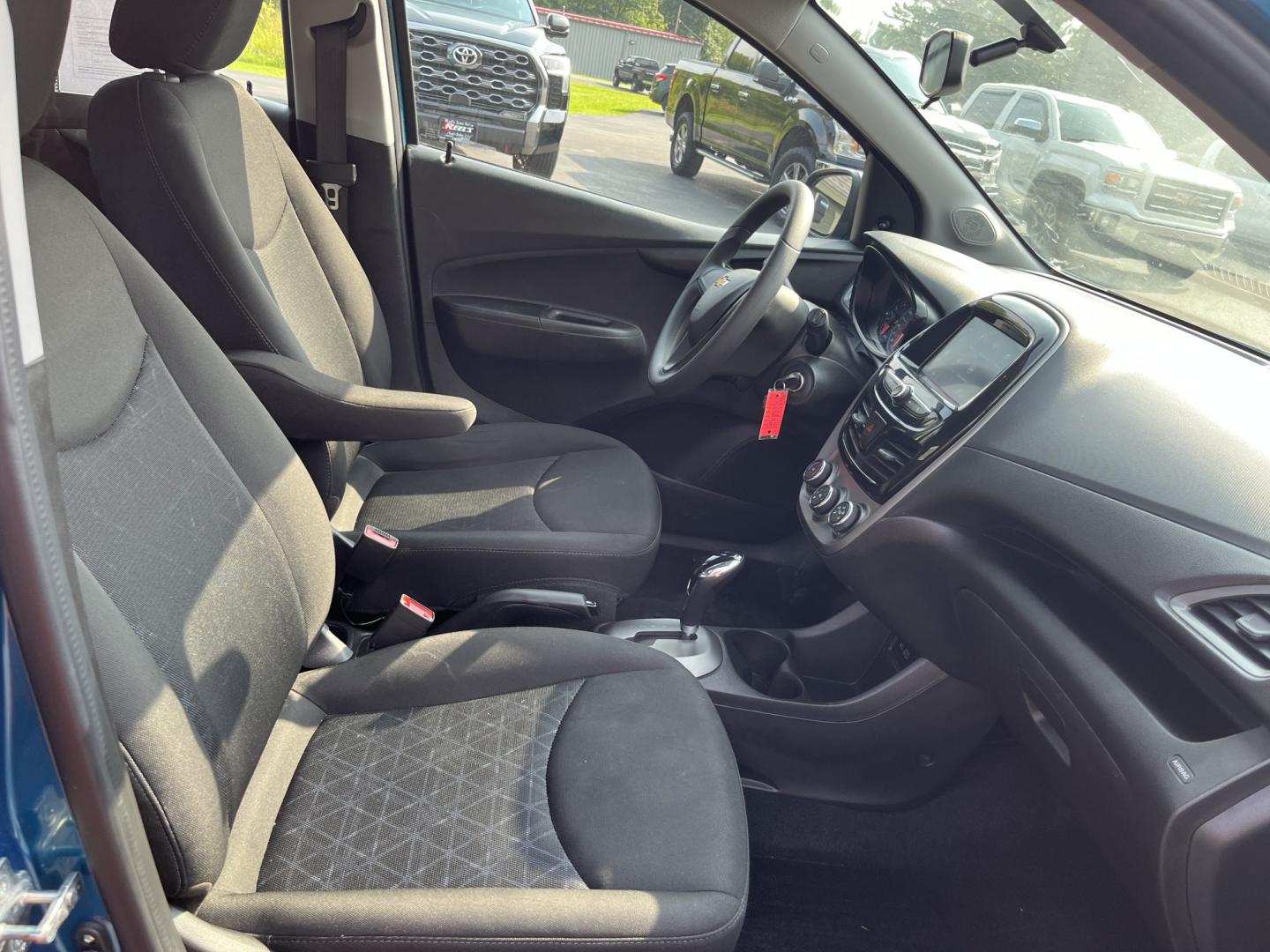2020 Blue /Black Chevrolet Spark LS CVT (KL8CB6SA8LC) with an 1.4L I4 16V DOHC engine, Automatic transmission, located at 11115 Chardon Rd. , Chardon, OH, 44024, (440) 214-9705, 41.580246, -81.241943 - 2020 Chevrolet Spark LS – Small Car, Big Personality, and Excellent Efficiency Sometimes the best car is the one that makes everyday life simpler and more affordable. This 2020 Chevrolet Spark LS does exactly that. Powered by a lively 1.4L EcoTec engine, it delivers an impressive 38 MPG highway a- Photo#28