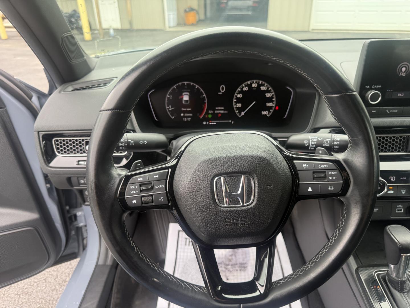 2024 Gray /Black Honda Civic Sport (19XFL2H87RE) with an 2.0L I4 DOHC 16V engine, Automatic transmission, located at 547 E. Main St., Orwell, OH, 44076, (440) 437-5893, 41.535435, -80.847855 - 2024 Honda Civic Hatch Sport – Modern Style with Strong Efficiency and Everyday Tech If you want a compact car that feels current, efficient, and enjoyable to drive, this 2024 Honda Civic Hatch Sport is a strong match. The responsive 2.0L engine delivers a solid balance of performance and fuel ec- Photo#13
