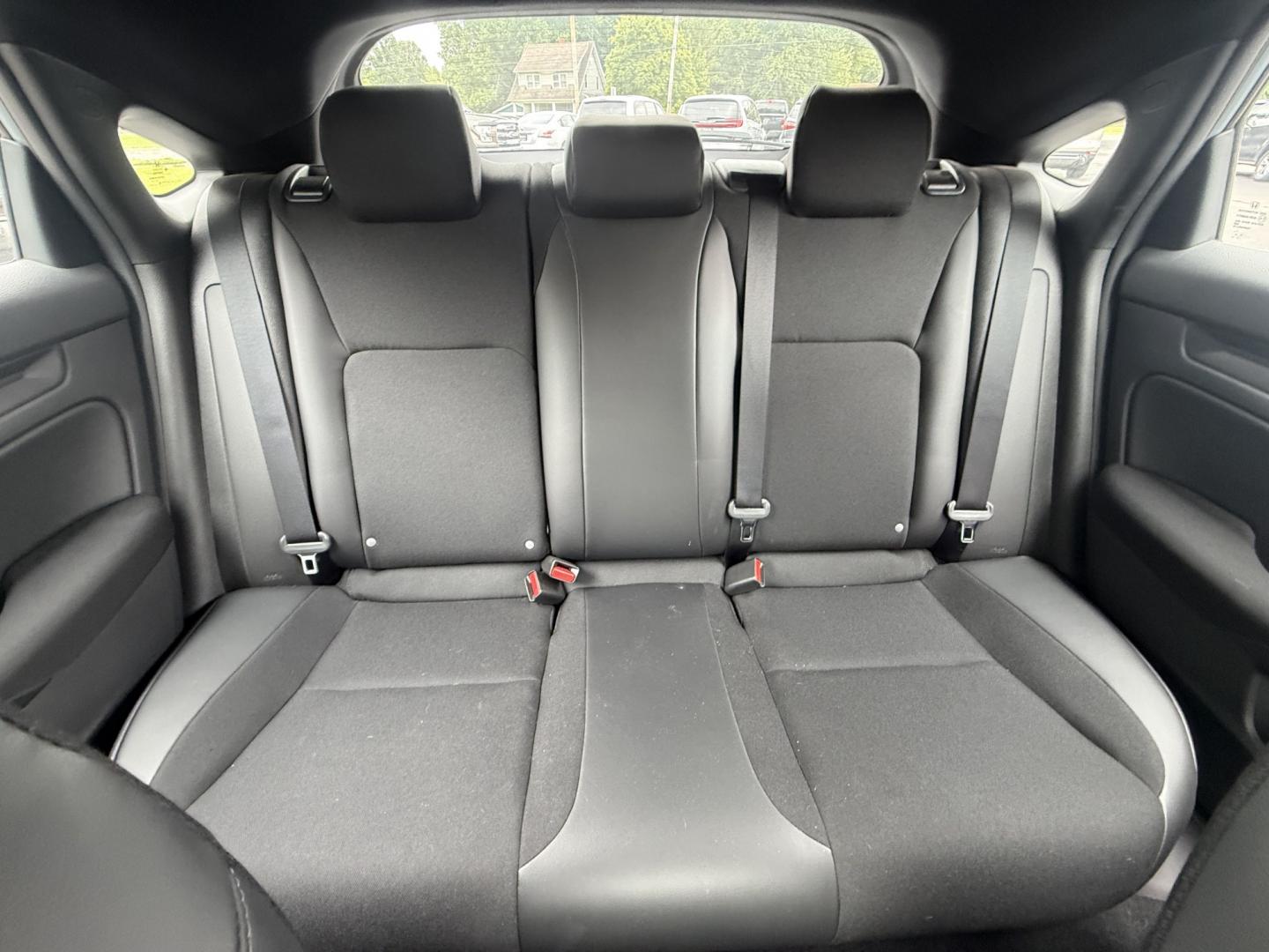 2024 Gray /Black Honda Civic Sport (19XFL2H87RE) with an 2.0L I4 DOHC 16V engine, Automatic transmission, located at 547 E. Main St., Orwell, OH, 44076, (440) 437-5893, 41.535435, -80.847855 - 2024 Honda Civic Hatch Sport – Modern Style with Strong Efficiency and Everyday Tech If you want a compact car that feels current, efficient, and enjoyable to drive, this 2024 Honda Civic Hatch Sport is a strong match. The responsive 2.0L engine delivers a solid balance of performance and fuel ec- Photo#18