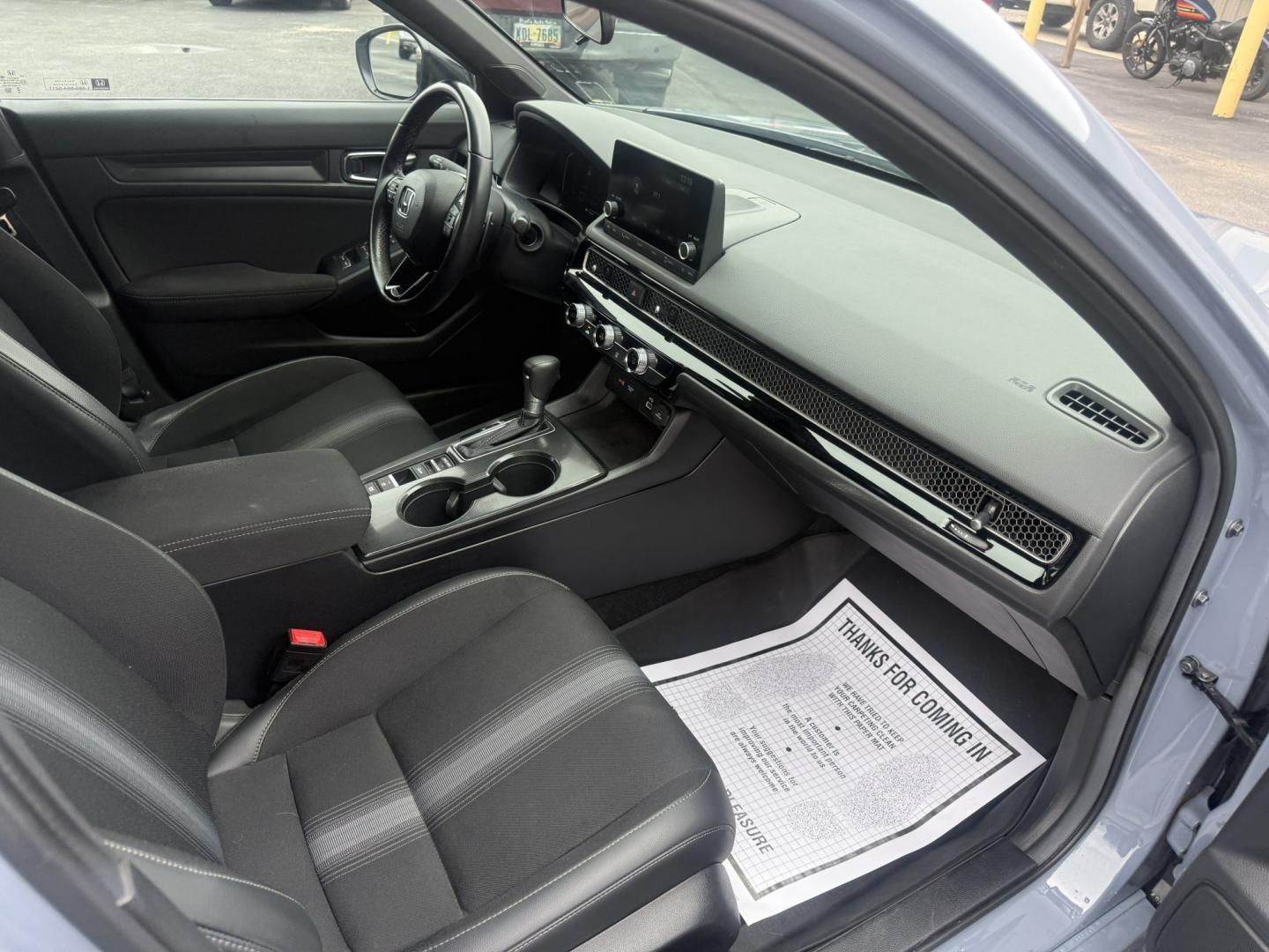 2024 Gray /Black Honda Civic Sport (19XFL2H87RE) with an 2.0L I4 DOHC 16V engine, Automatic transmission, located at 547 E. Main St., Orwell, OH, 44076, (440) 437-5893, 41.535435, -80.847855 - 2024 Honda Civic Hatch Sport – Modern Style with Strong Efficiency and Everyday Tech If you want a compact car that feels current, efficient, and enjoyable to drive, this 2024 Honda Civic Hatch Sport is a strong match. The responsive 2.0L engine delivers a solid balance of performance and fuel ec- Photo#35