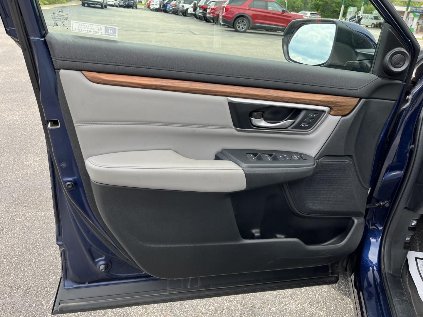 2022 Blue Honda CR-V Hybrid EX-L (5J6RT6H84NL) with an 2.0L I4 DOHC 16V HYBRID engine, Automatic transmission, located at 11115 Chardon Rd. , Chardon, OH, 44024, (440) 214-9705, 41.580246, -81.241943- Photo#16